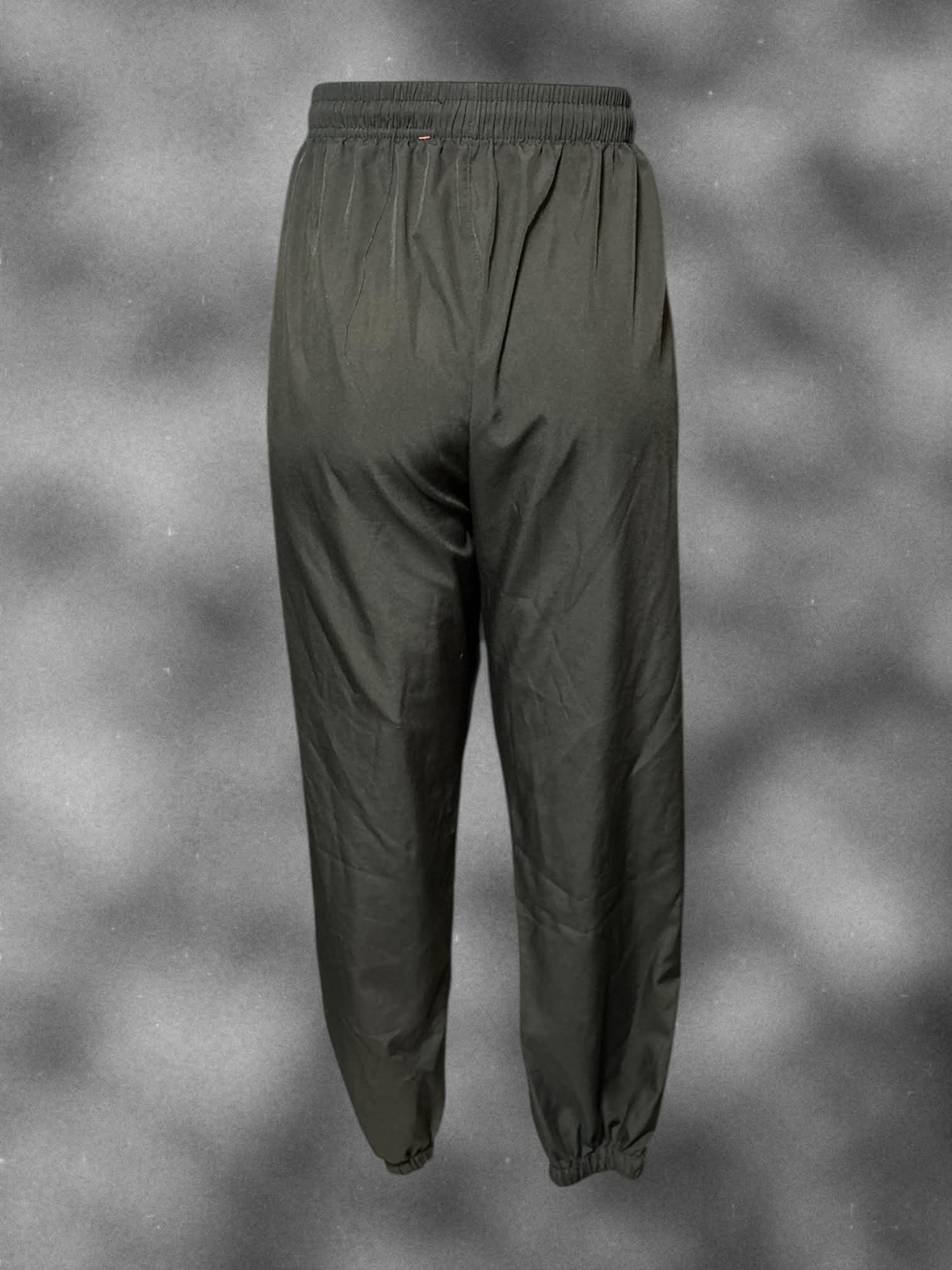 L Black pants with white panel on sides, pockets, and drawstring