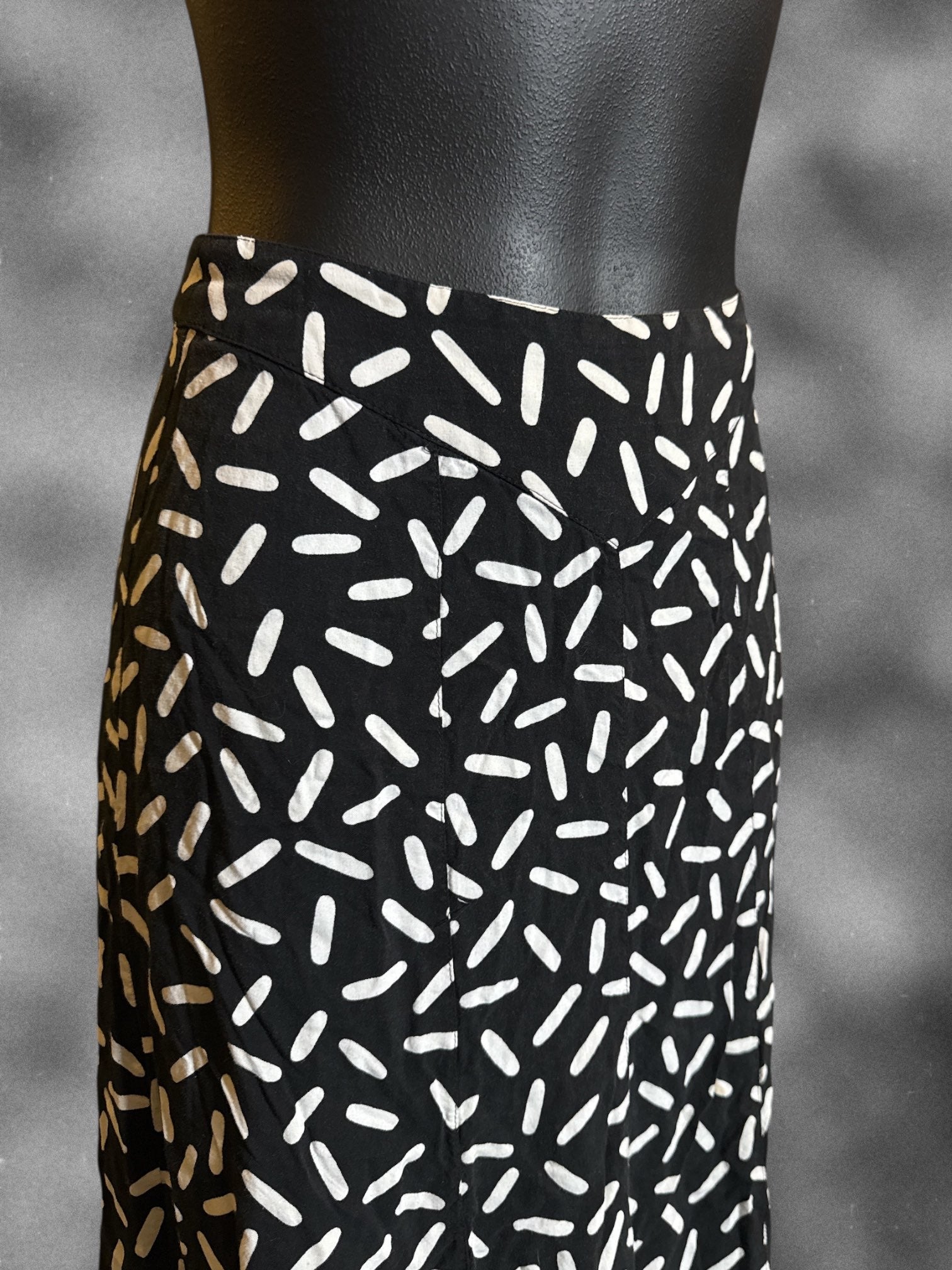 XS SK & Company vintage black midi skirt with white designs and side button closure
