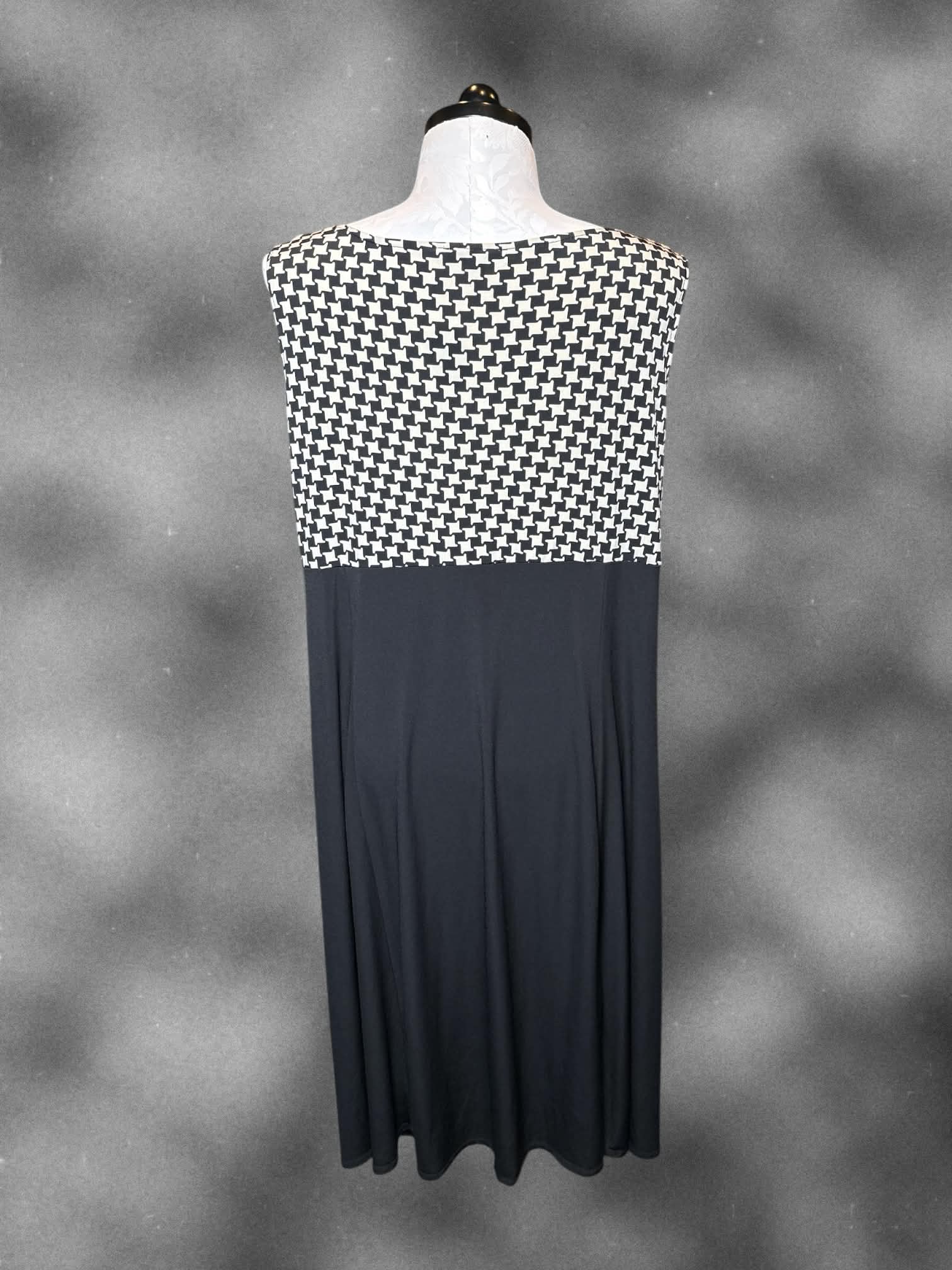 4X Danny and Nicole black and white two piece dress and cardigan set with houndstooth pattern, and ruffly neckline