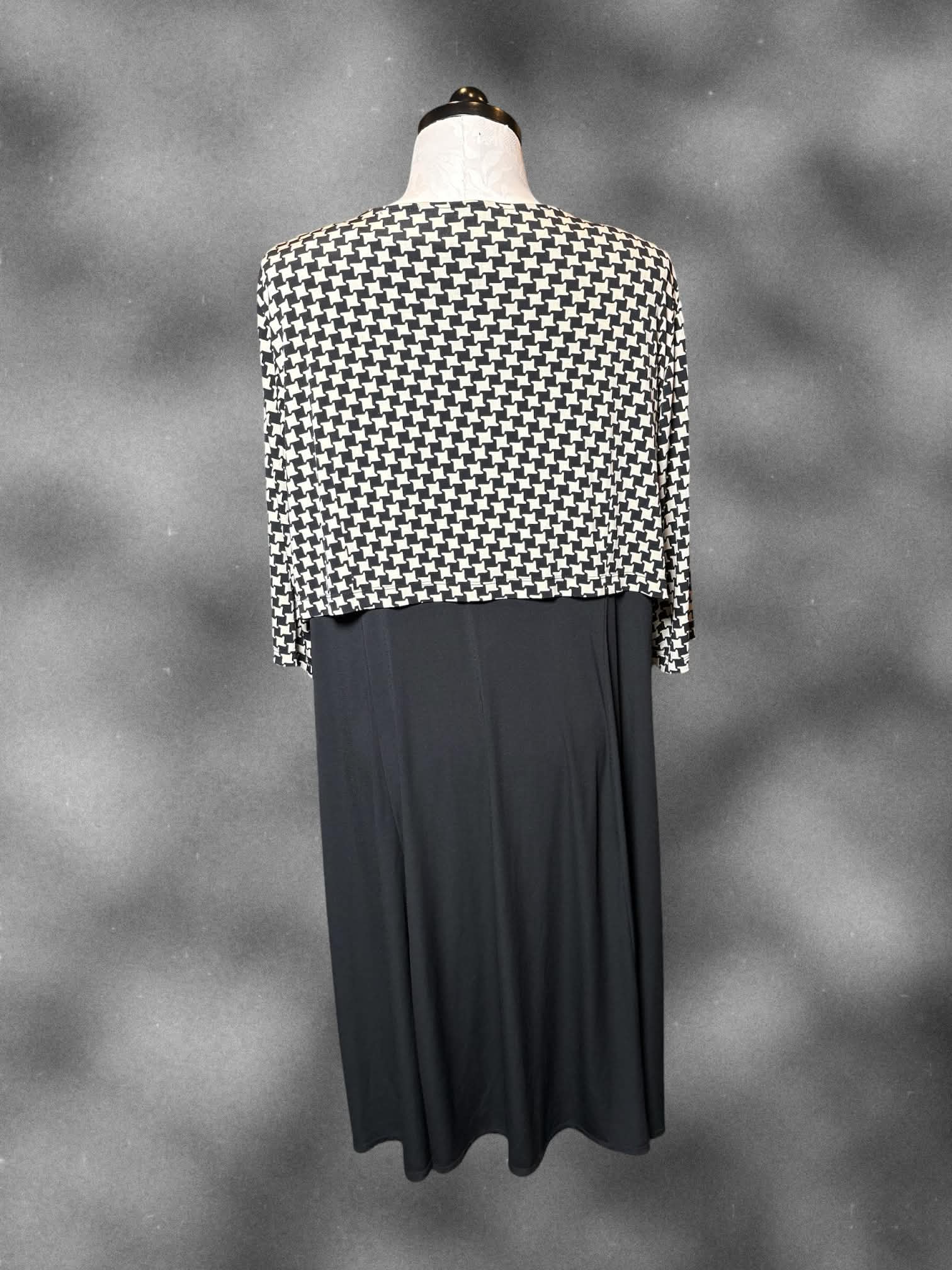 4X Danny and Nicole black and white two piece dress and cardigan set with houndstooth pattern, and ruffly neckline
