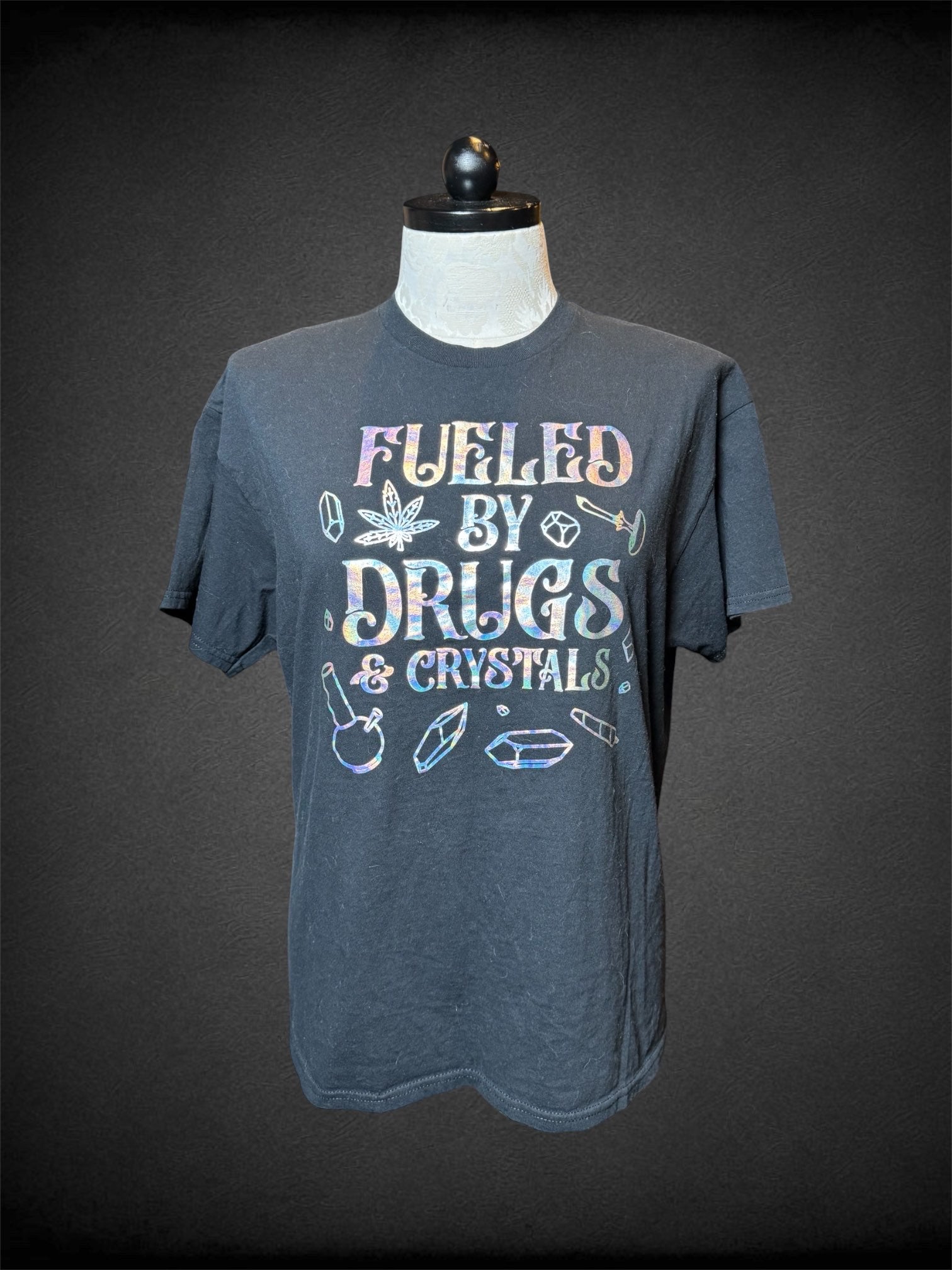 0X Spencer’s black t shirt with “Fueled by Drugs & Crystals” graphic