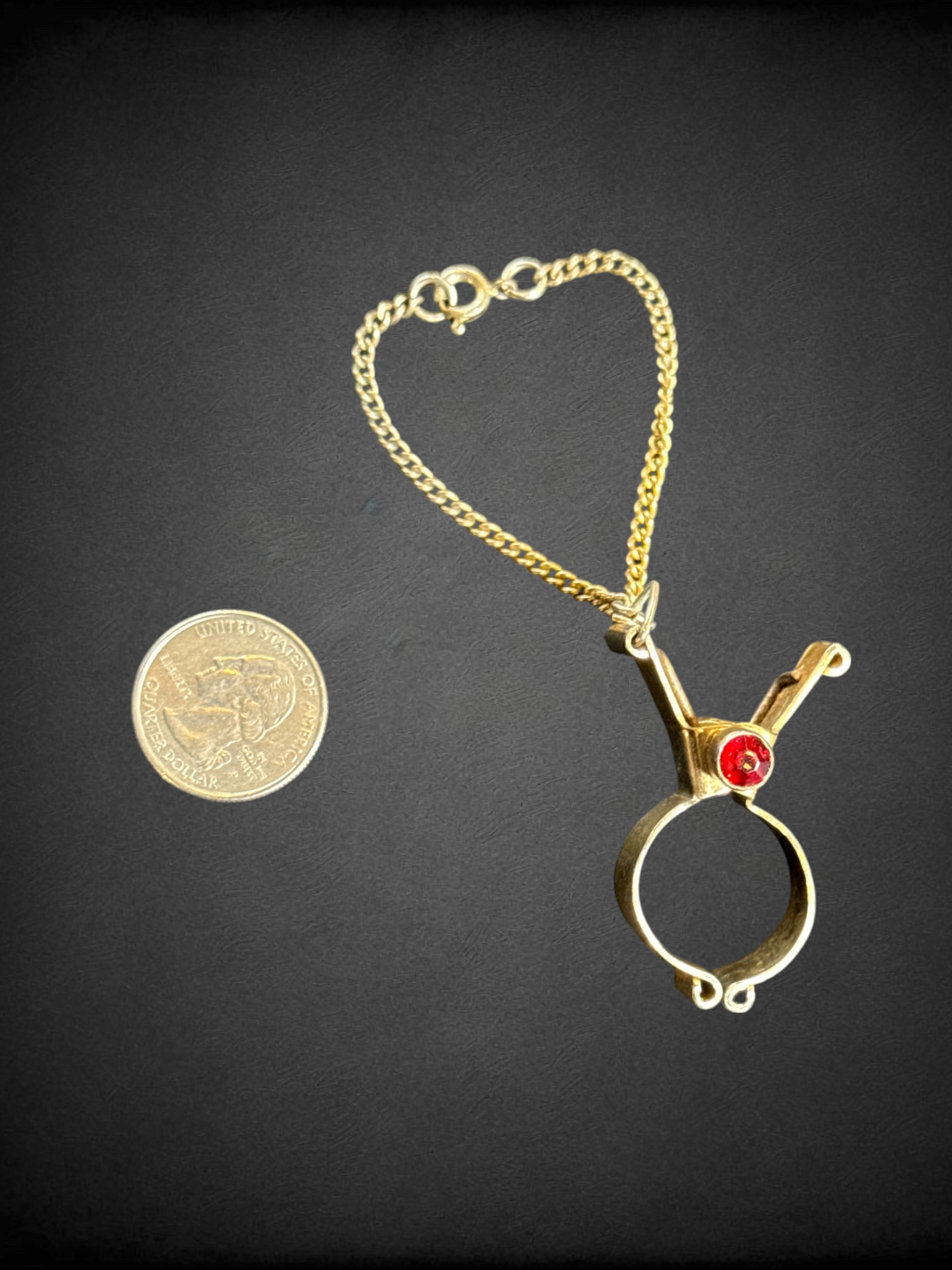 Vintage glove clip with red stone