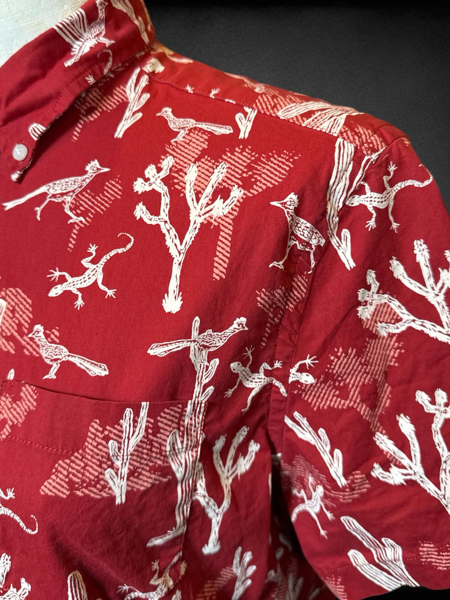 XL Sonoma red short sleeve button down with desert related prints, and pocket on front