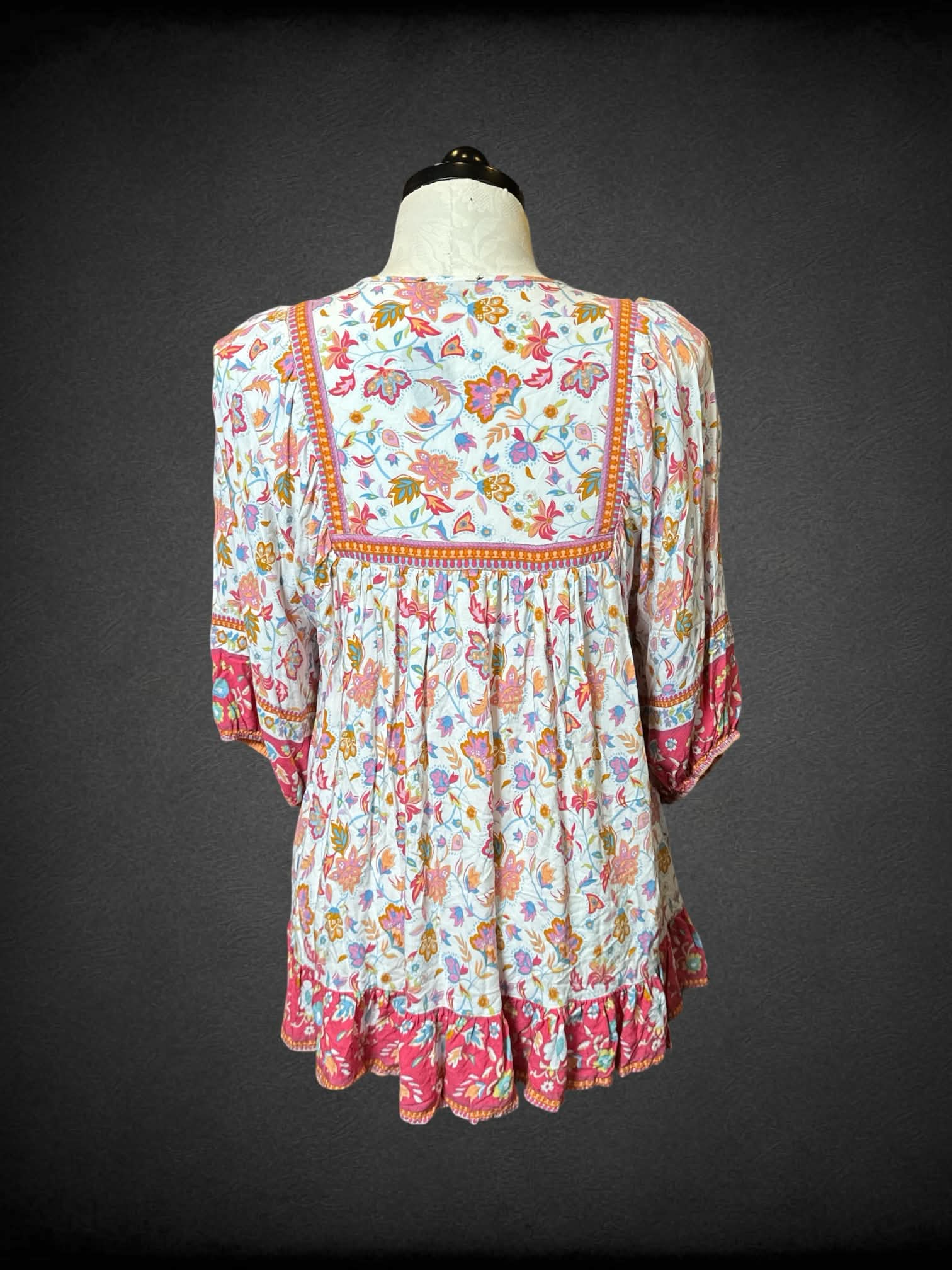 1X Rachel Zoe white long sleeve top with pink and orange paisley design, tie on front, and balloon sleeves