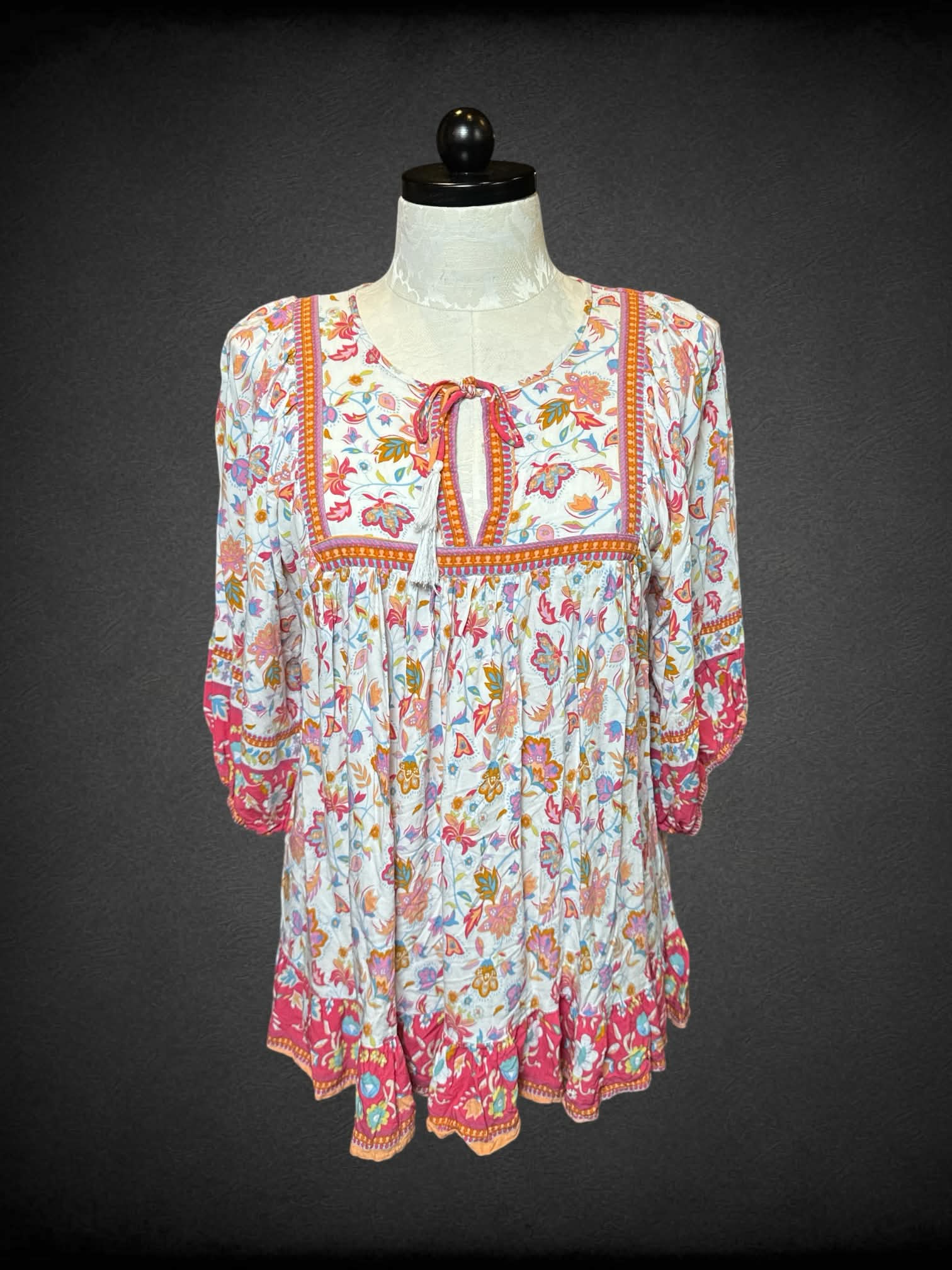 1X Rachel Zoe white long sleeve top with pink and orange paisley design, tie on front, and balloon sleeves