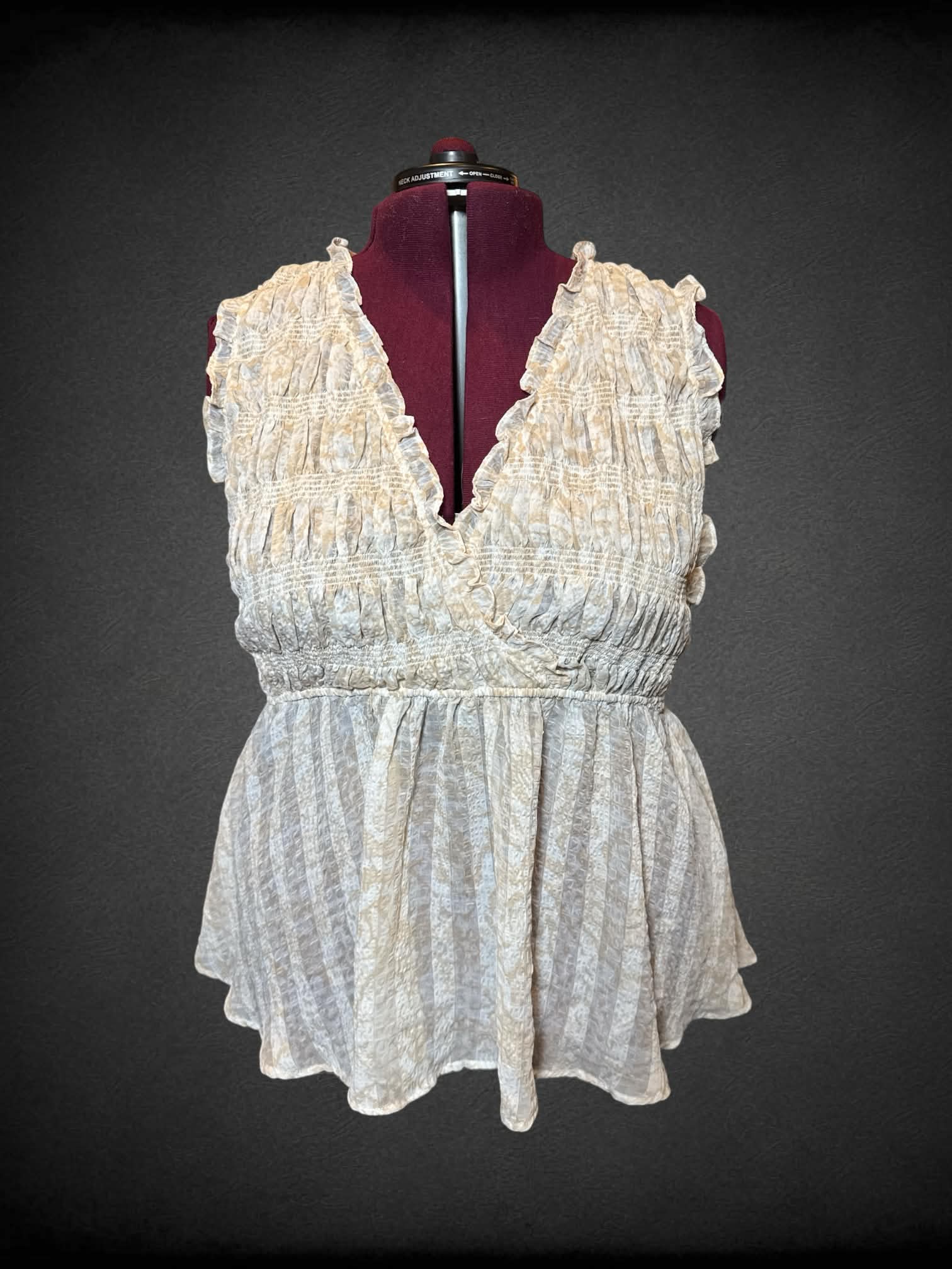 3X Torrid light brown and white sheer sleeveless top with tie on back, and faux wrap design