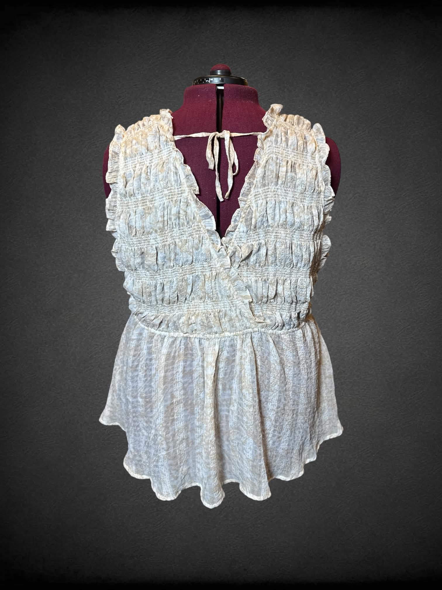 3X Torrid light brown and white sheer sleeveless top with tie on back, and faux wrap design