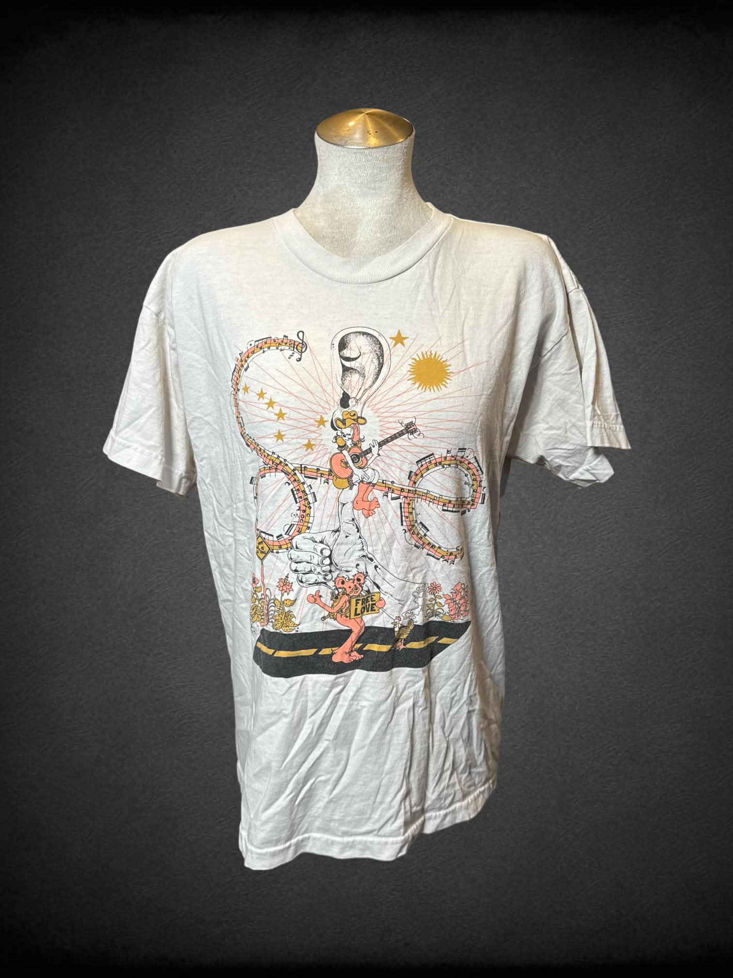 L Bayside white t shirt with “Sulivan Esso: Shaking Out the Numb tour” graphics