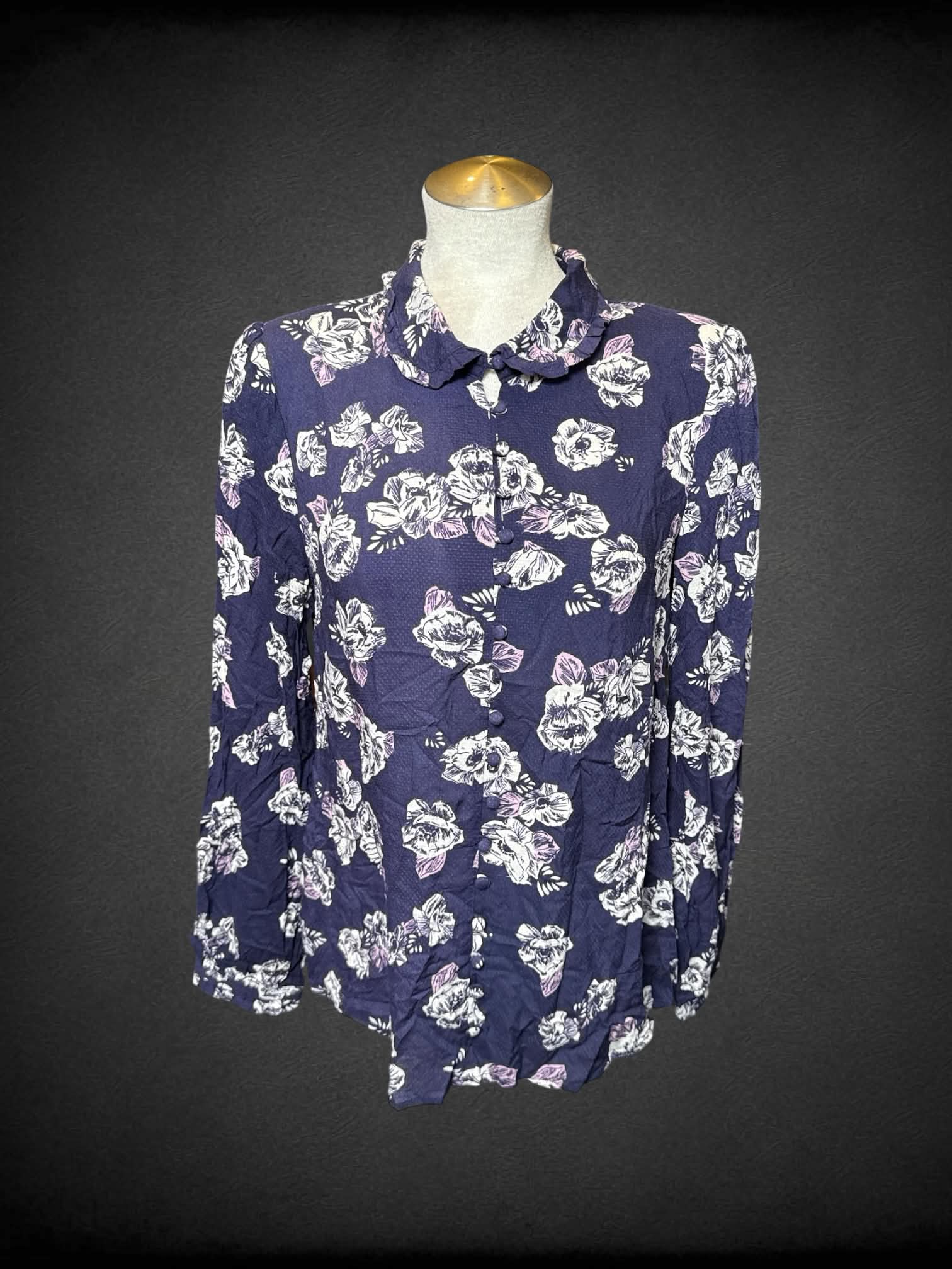 L ModCloth navy blue long sleeve button up with ruffled collar, and white and pink floral design