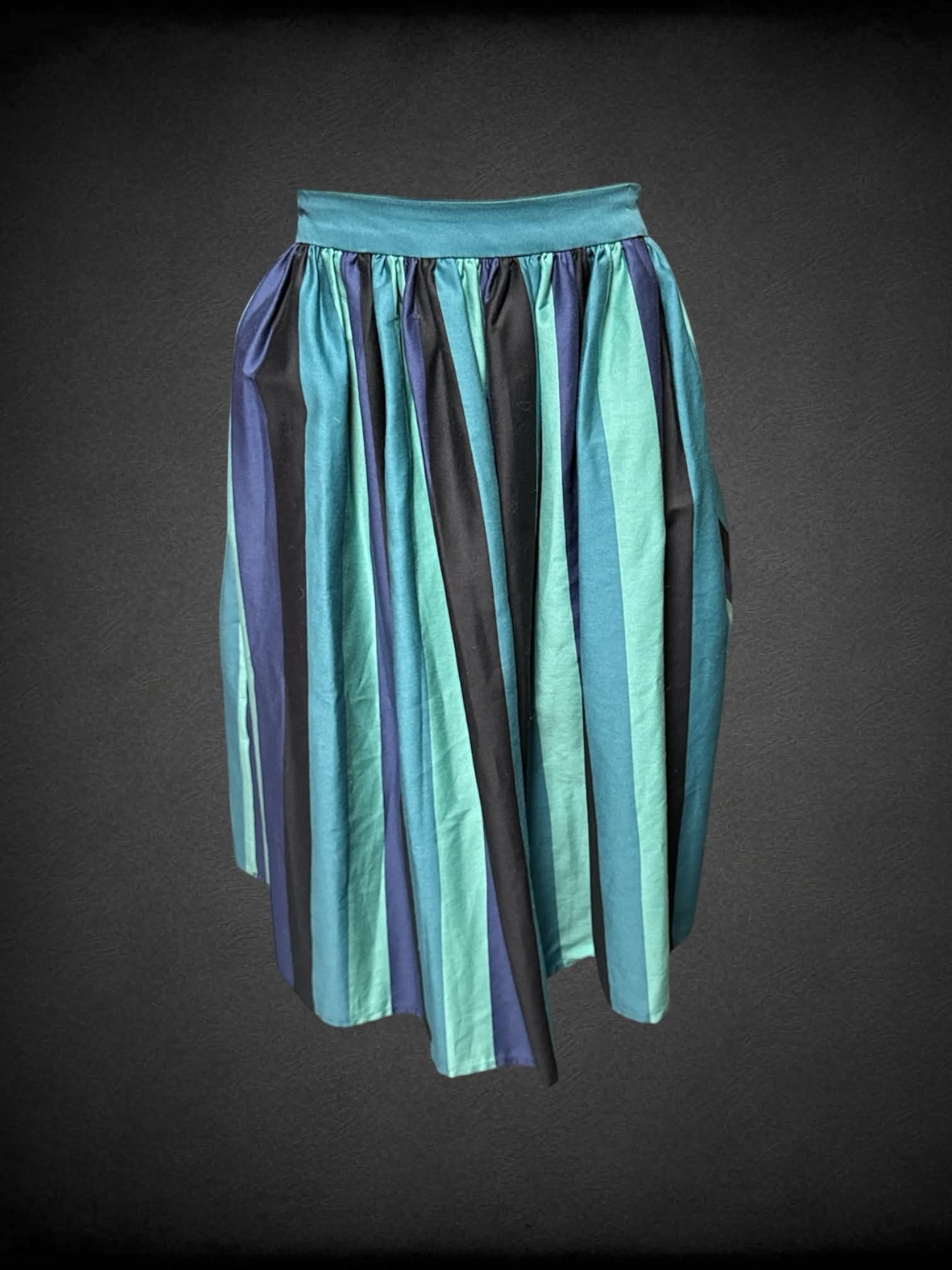 L Collectif turquoise, navy, and black striped pleated skirt with zipper on back
