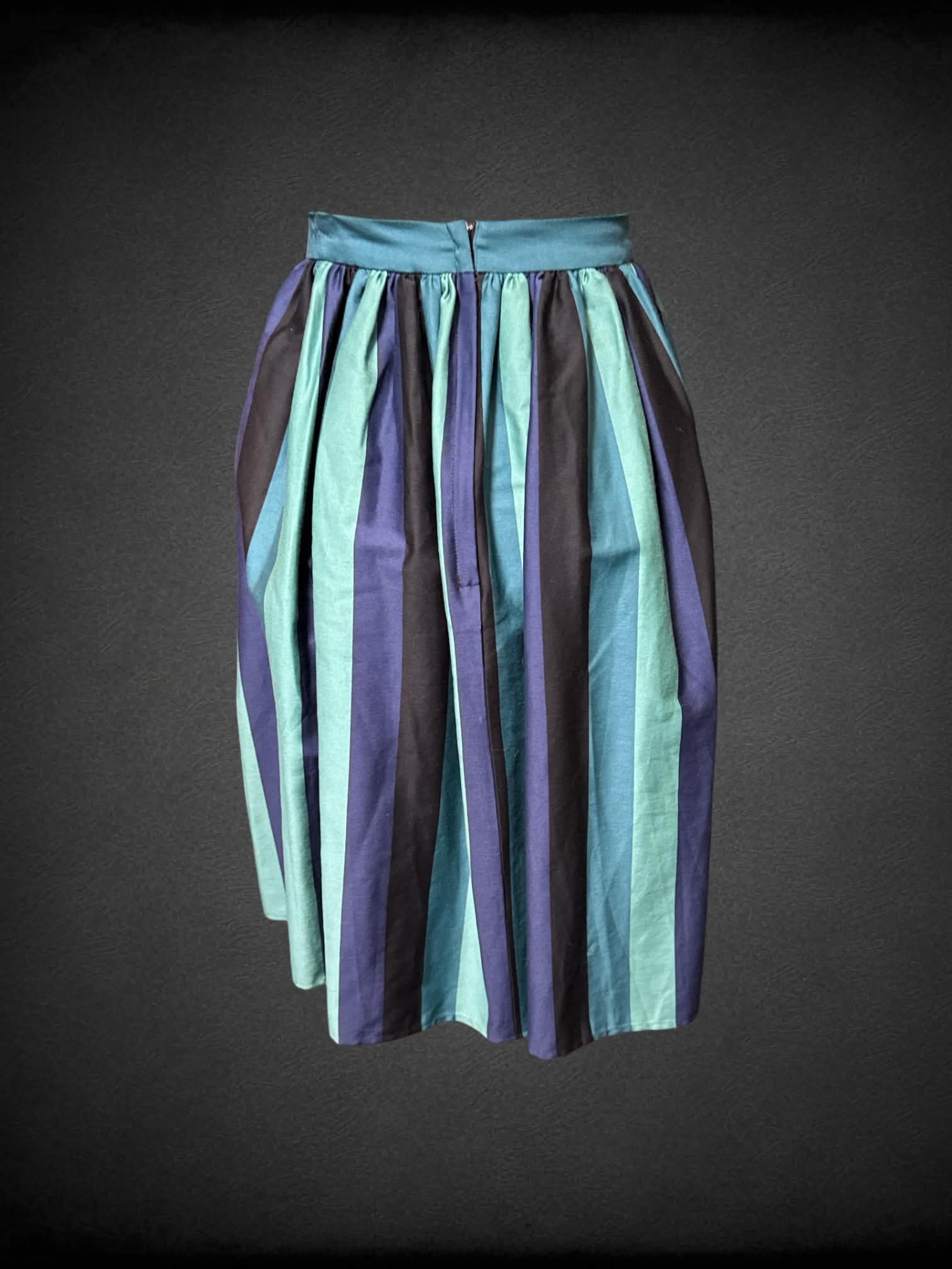 L Collectif turquoise, navy, and black striped pleated skirt with zipper on back