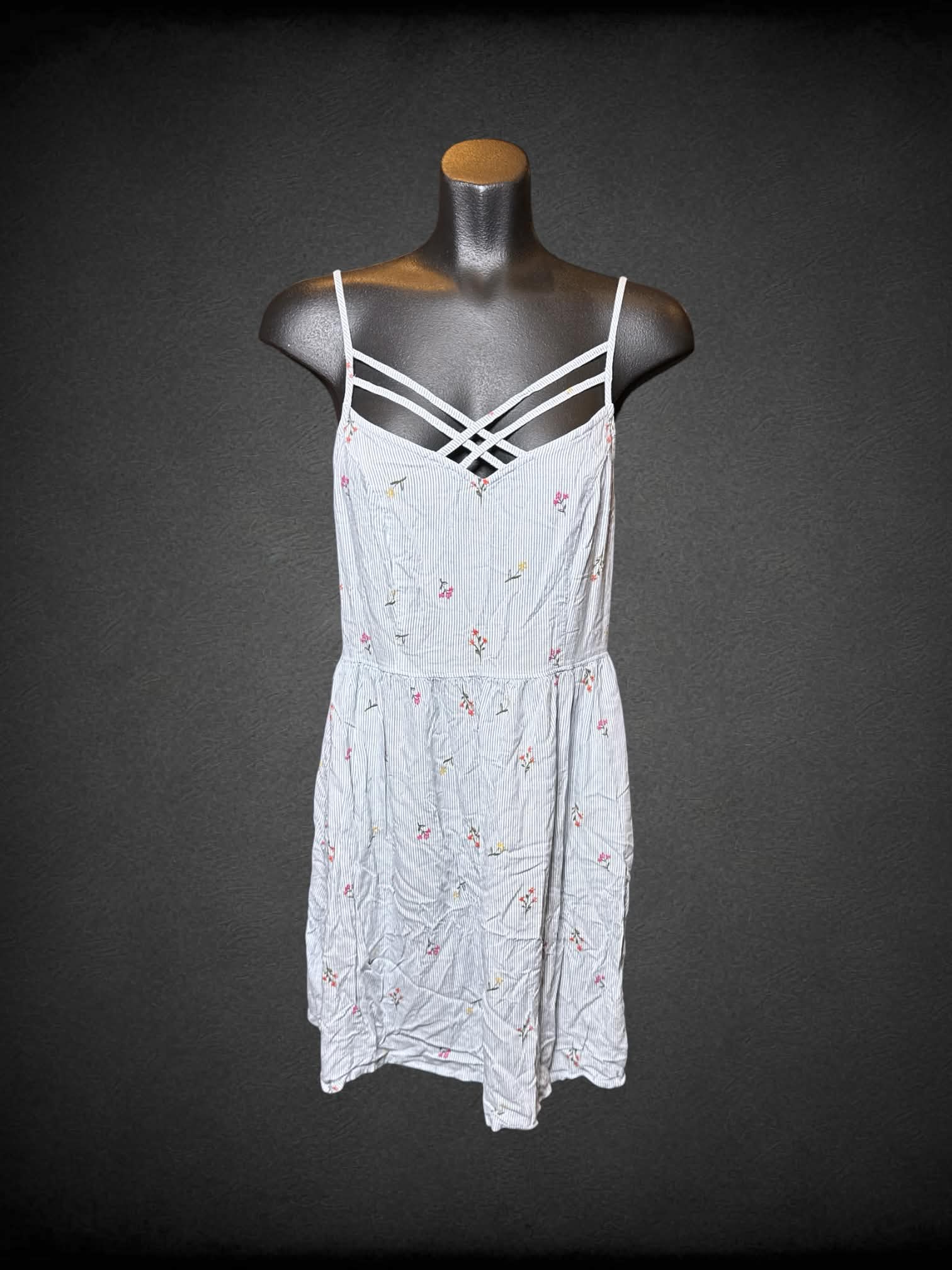 M So white sleeveless dress with blue stripes, florals, and shirred back