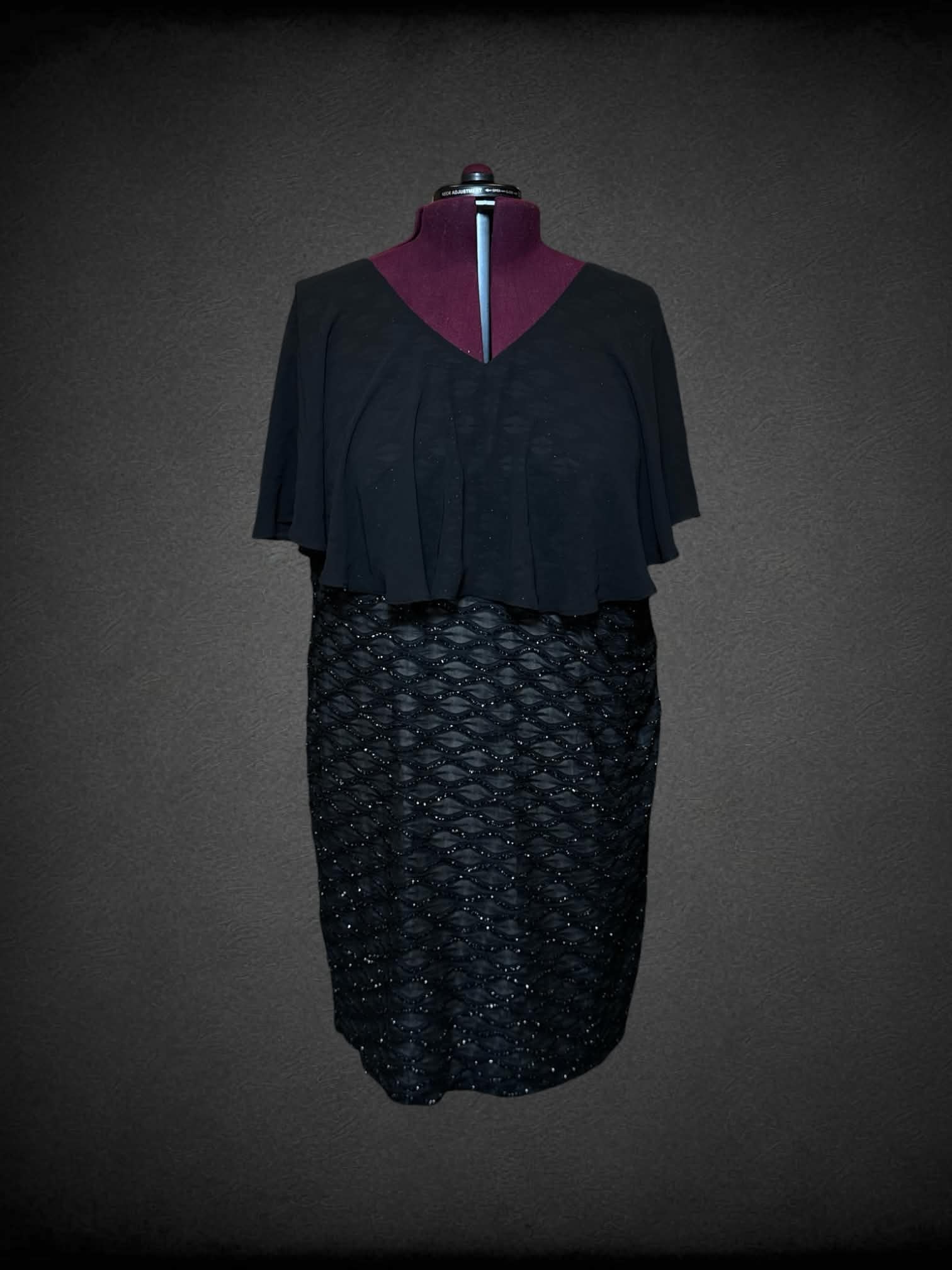 4X Connected Apparel black sleeveless dress with mesh overlay ontop, and wavy metallic tinsel design