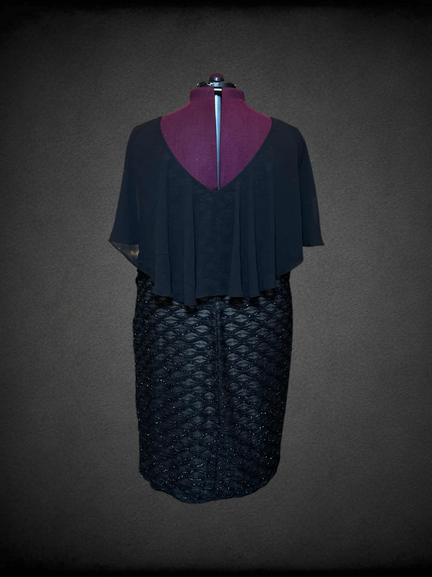 4X Connected Apparel black sleeveless dress with mesh overlay ontop, and wavy metallic tinsel design