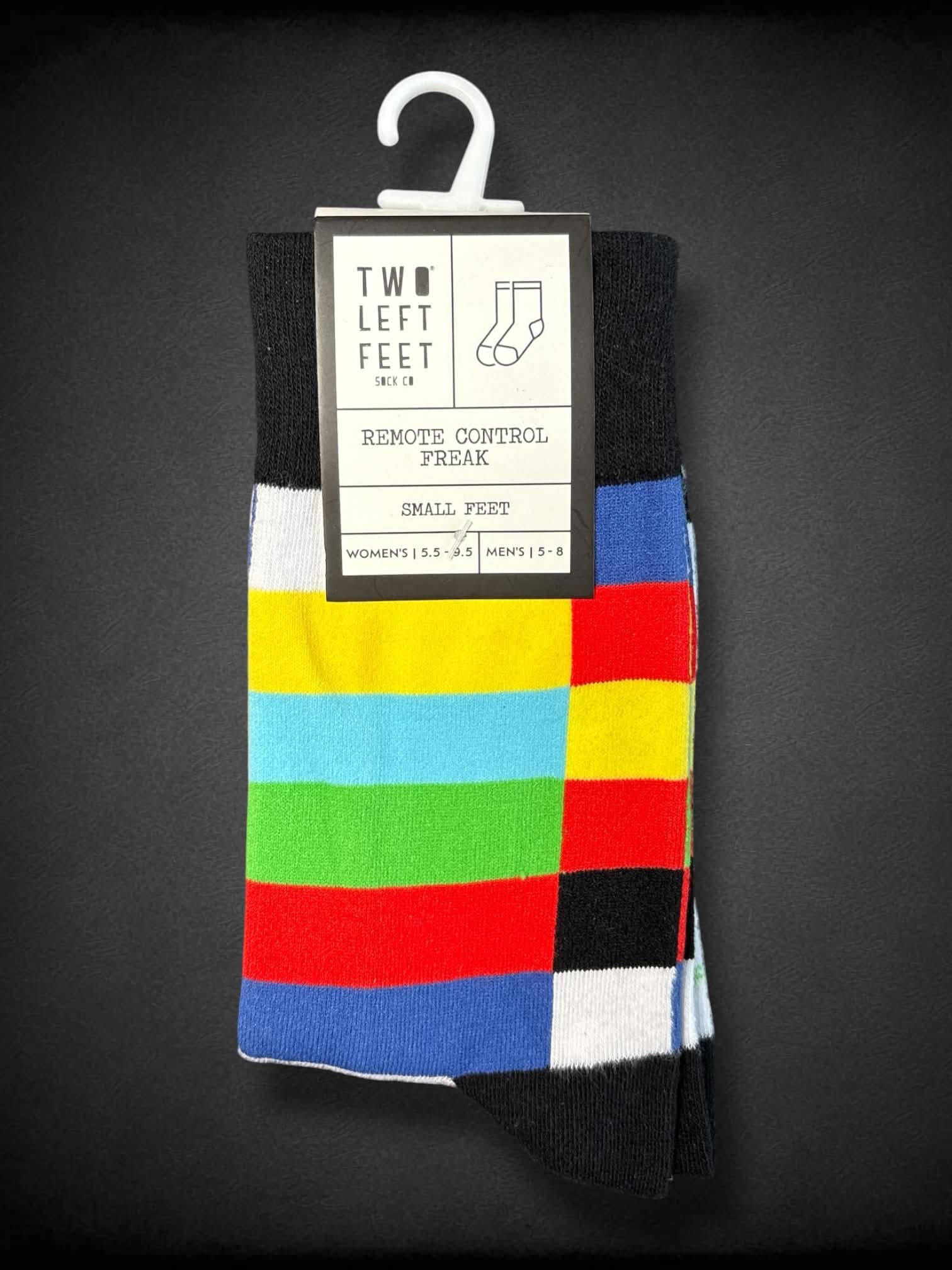 NWT Two Left Feet Sock Co. Multicolored with black an white text ‘If you can read this pass me the remote’ socks