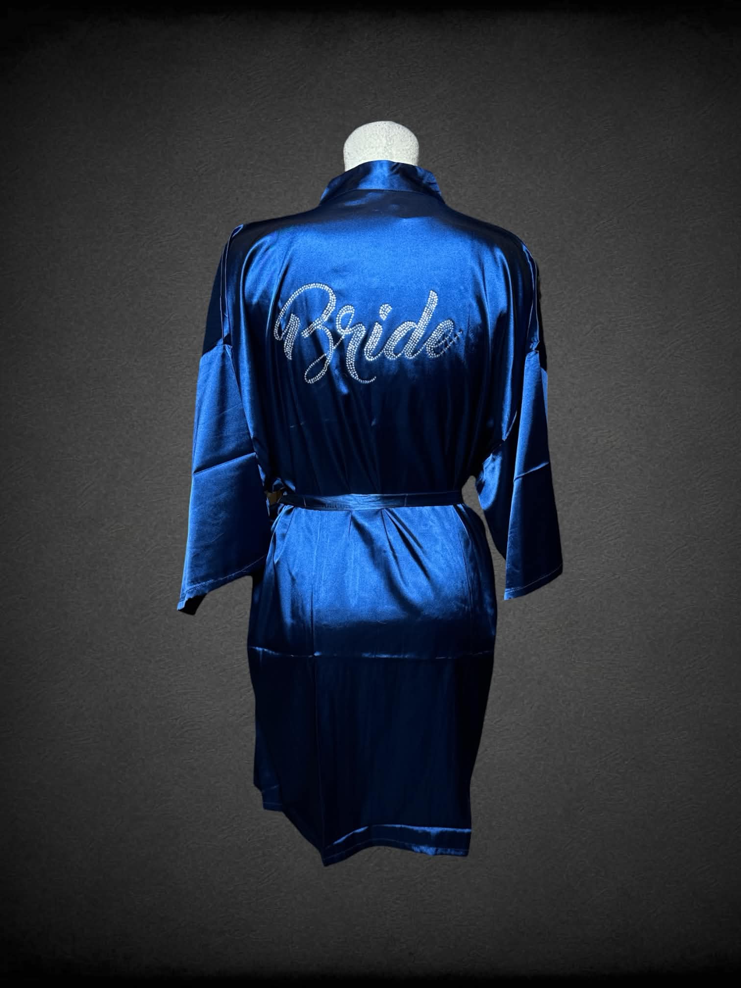 L royal blue silk robe with bedazzled “Bride” writing on back