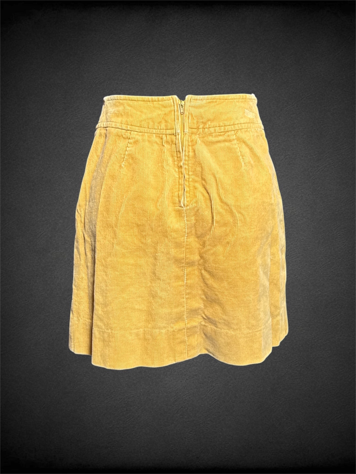 XS A.I.A vintage yellow corduroy skirt with decorative buttons on front, and zipper on back