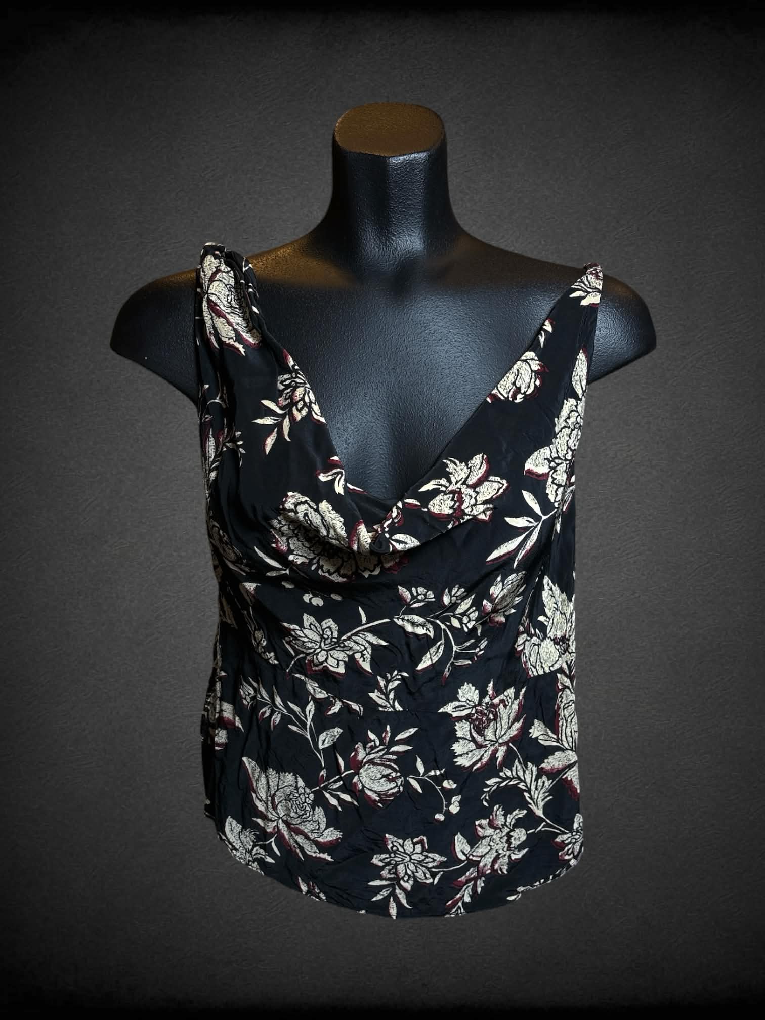 M J Crew black sleeveless floral top with twisted strap, and zipper on side