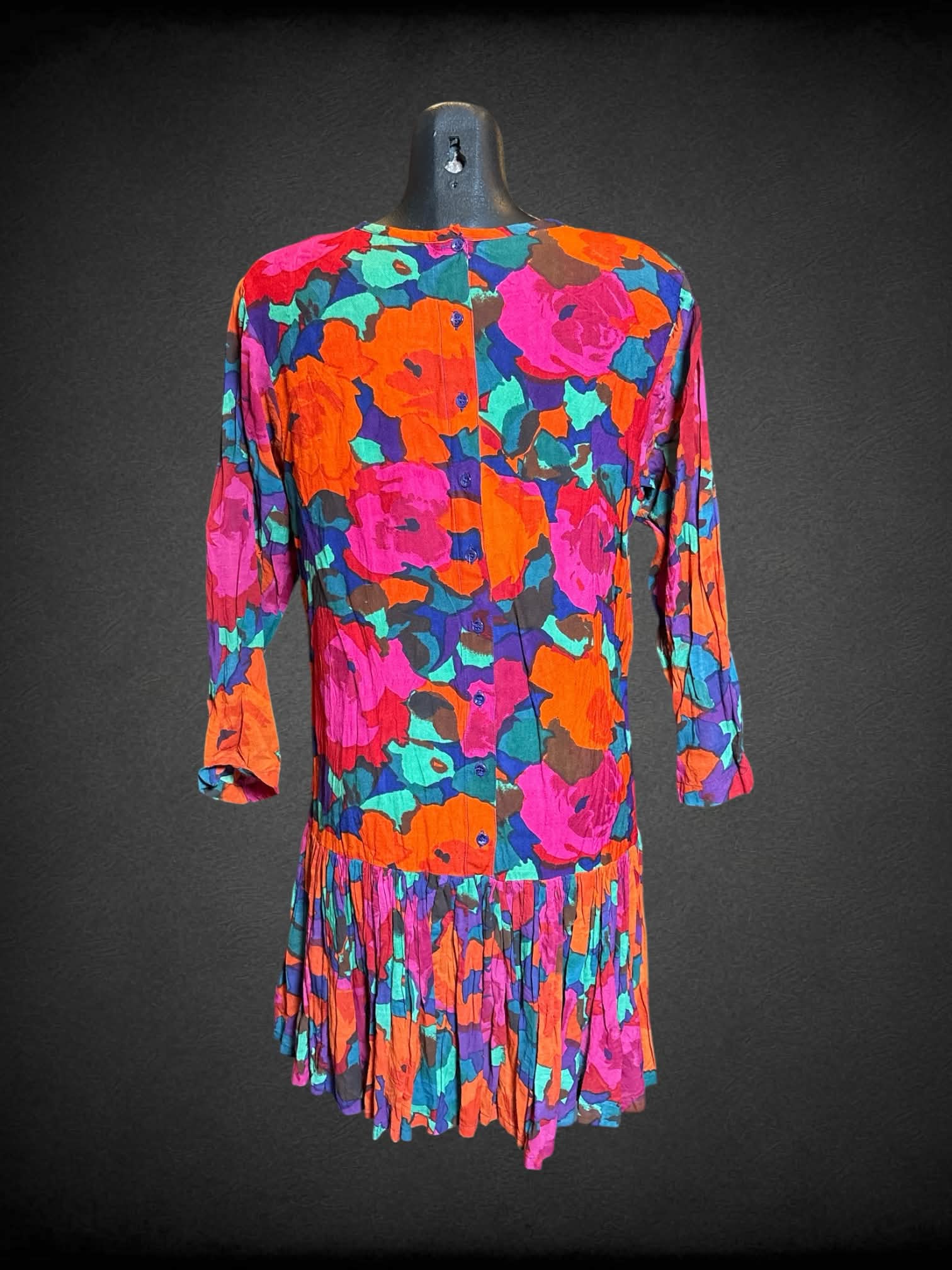 M Pasta vintage jewel tone colored long sleeve dress with buttons on back, and pleated bottom