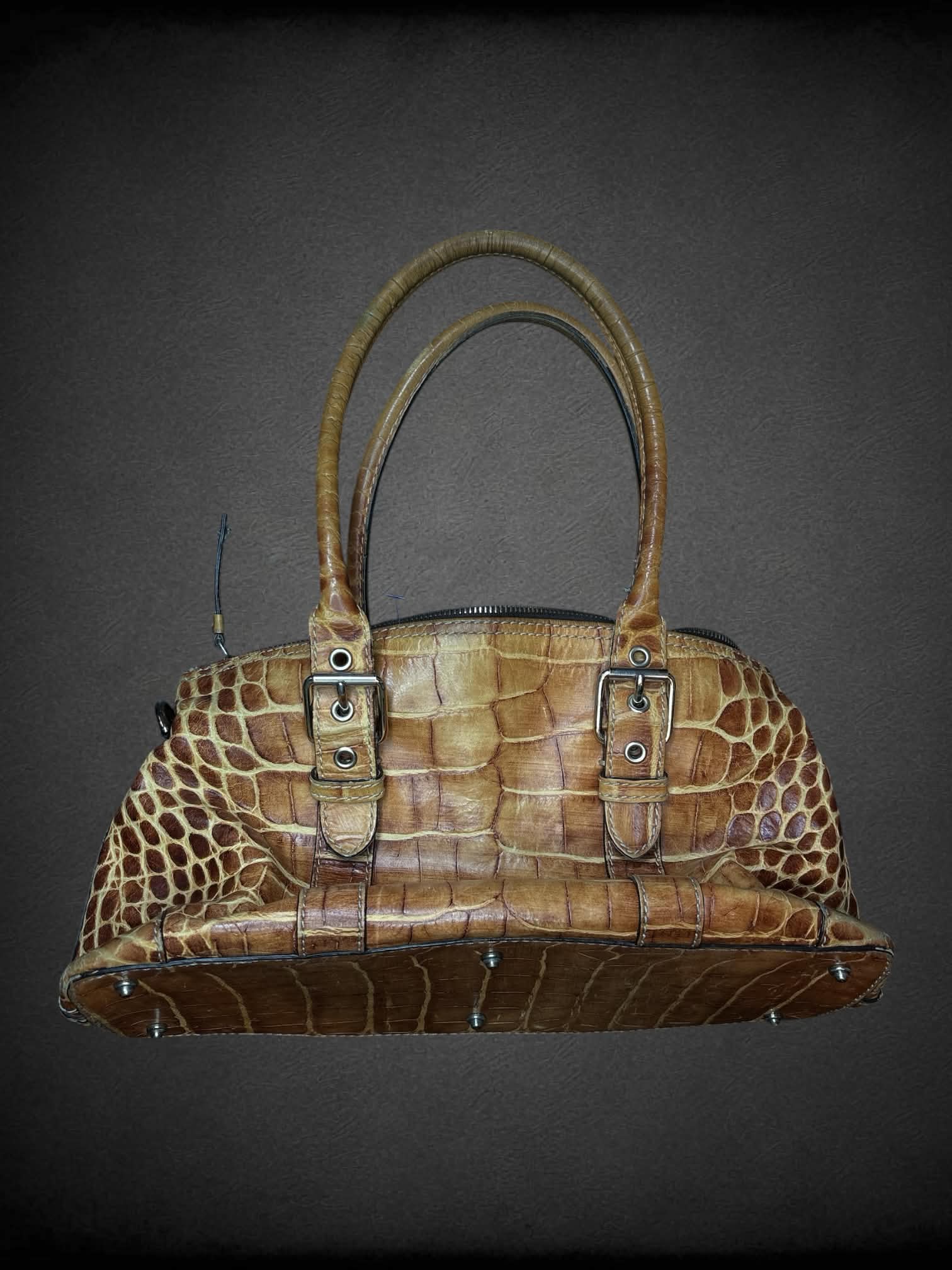 Dooney Bourke tan leather shoulder bag with zipper pockets