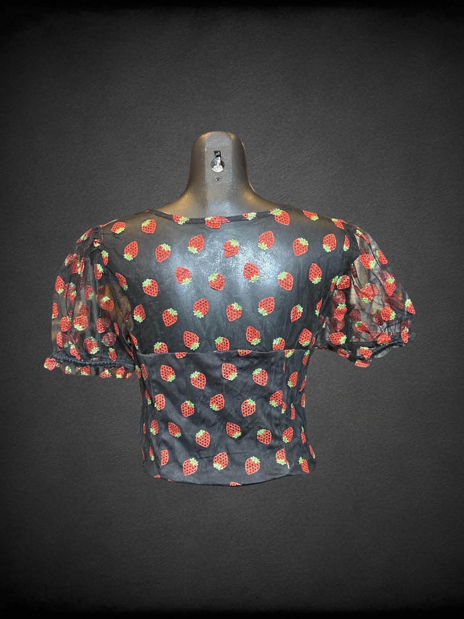 M Hot Topic black short sleeve top with mesh sleeves and overlay, metallic strawberry design,and zipper on side