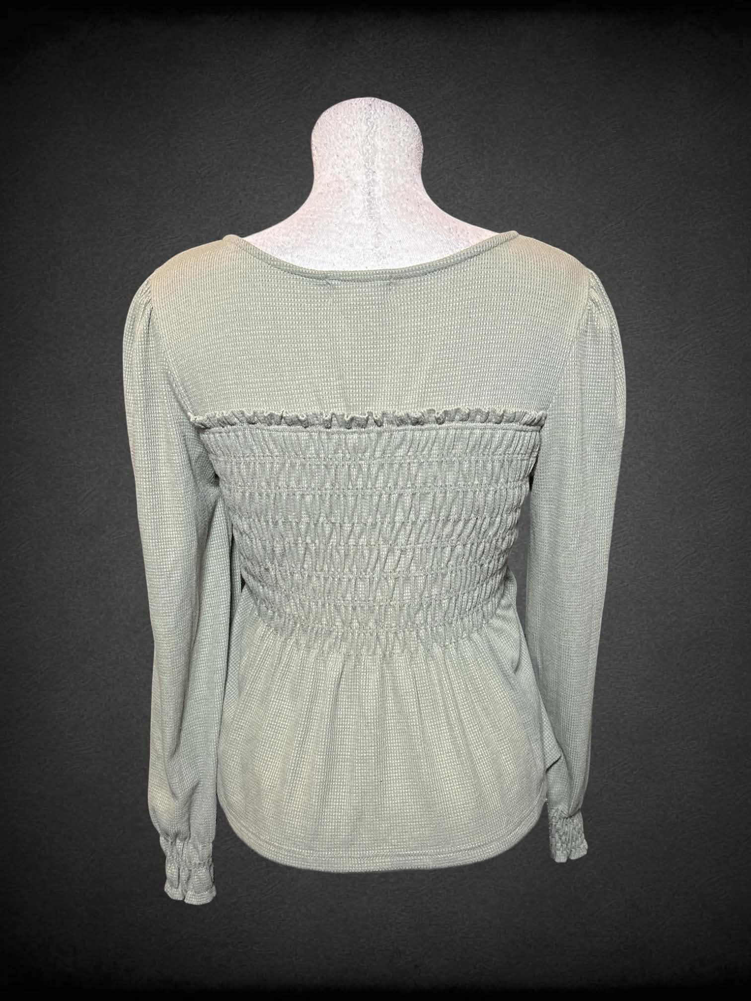 L Altar’d State green long sleeve waffle knit top with shirred bodice, and balloon sleeves