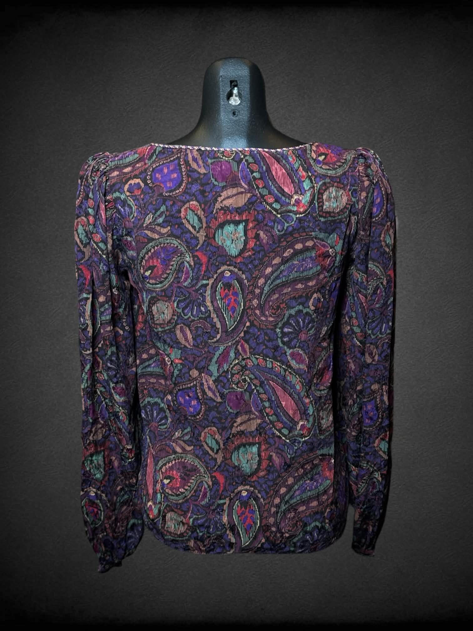 M Miss O by Oscar de la Renta vintage purple v neck top with colorful paisley pattern, padded shoulders, and embroidered cut out design on front