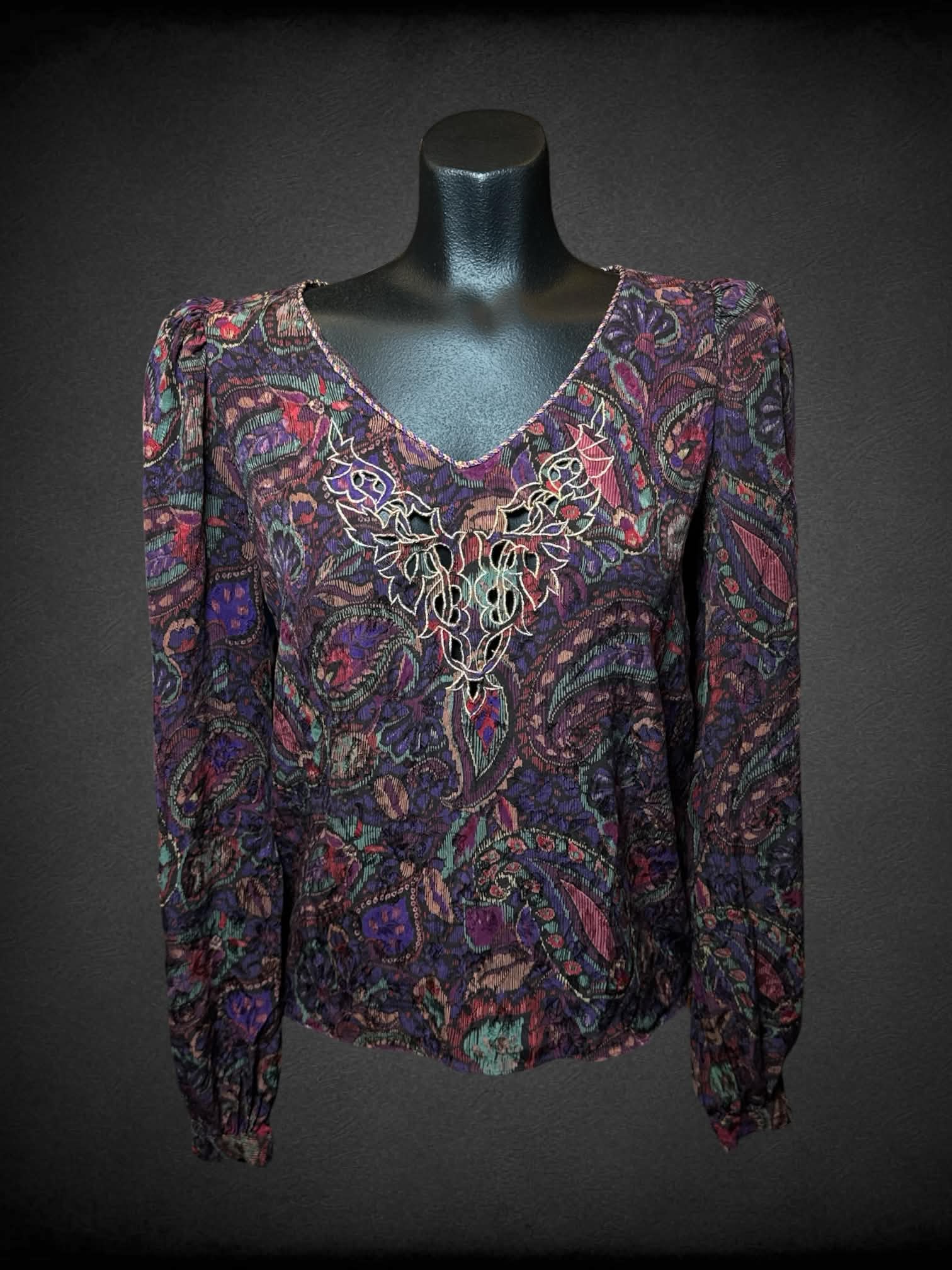 M Miss O by Oscar de la Renta vintage purple v neck top with colorful paisley pattern, padded shoulders, and embroidered cut out design on front