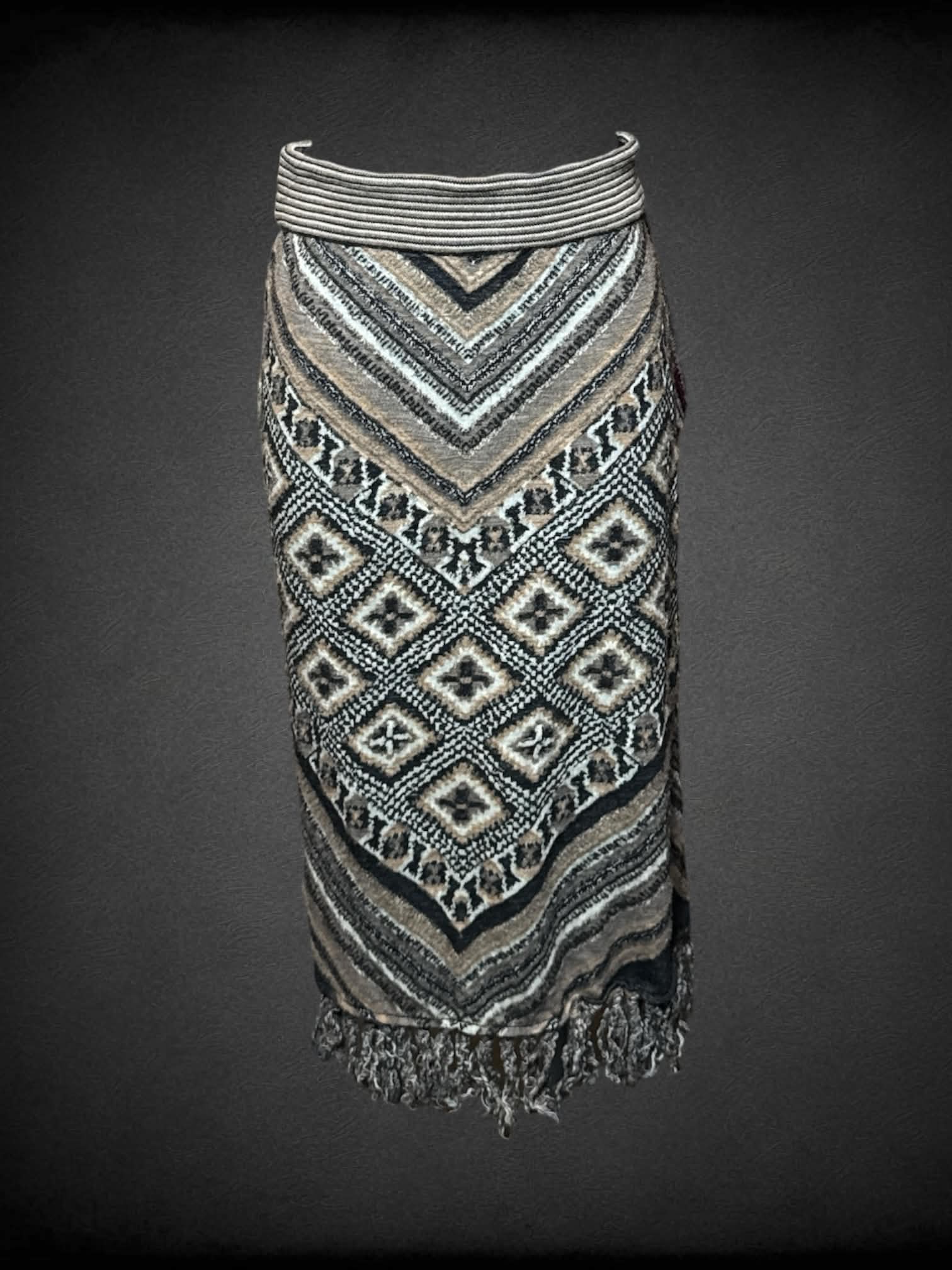M Free People brown wool skirt with black and white diamond pattern, and tassels along bottom trim