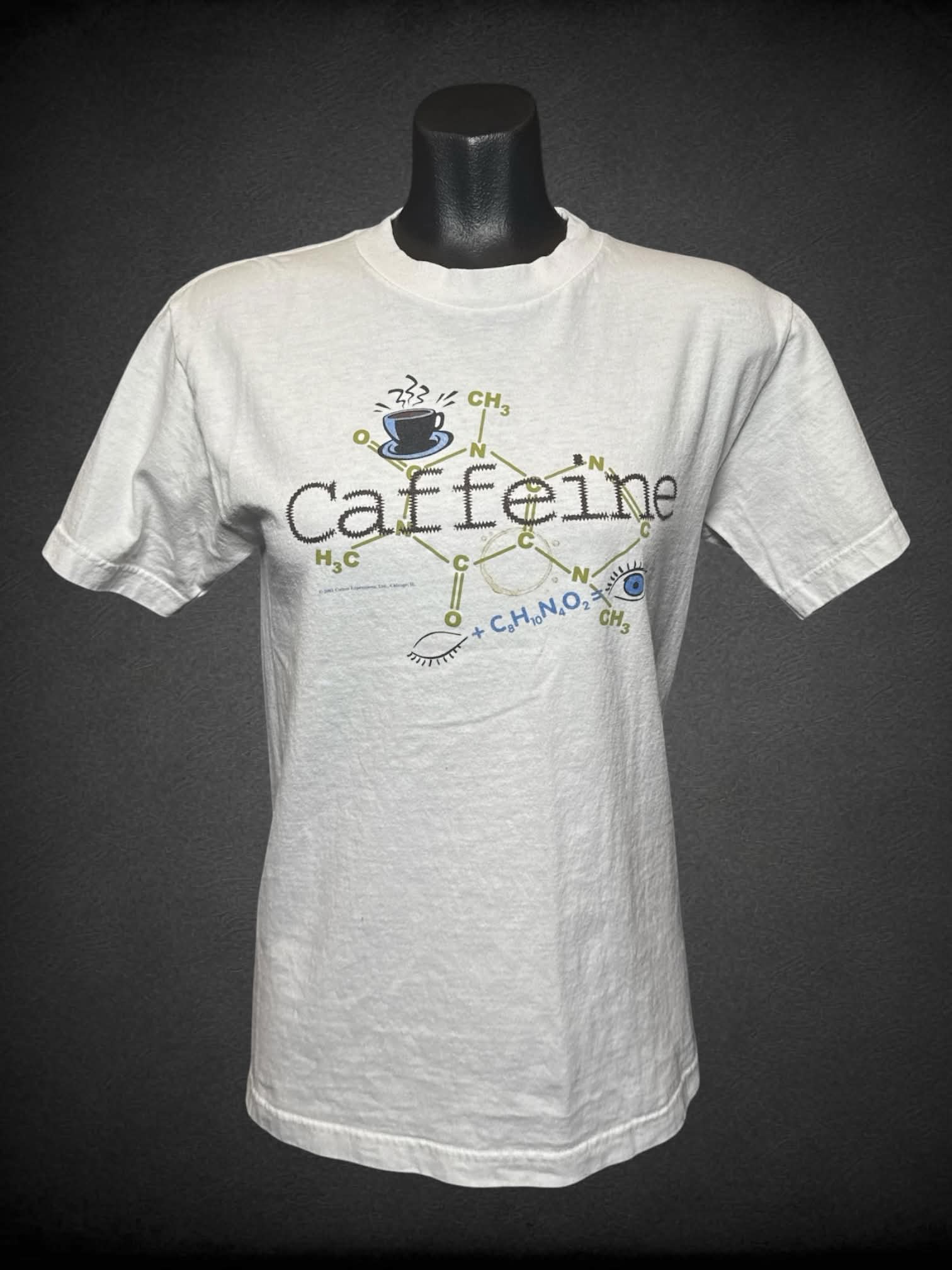 S Cotton Expressions vintage white t shirt with periodic table “caffeine” graphic on front, and “Carnegie Science Center” logo on sleeve