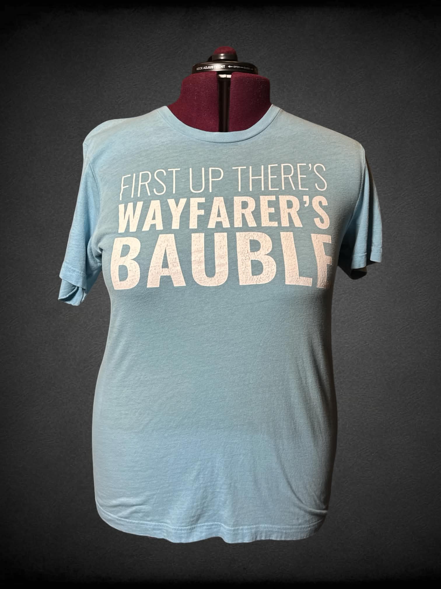 1X Magic The Gathering blue t shirt with “First Up There’s Wayfarer’s Bauble” writing on front