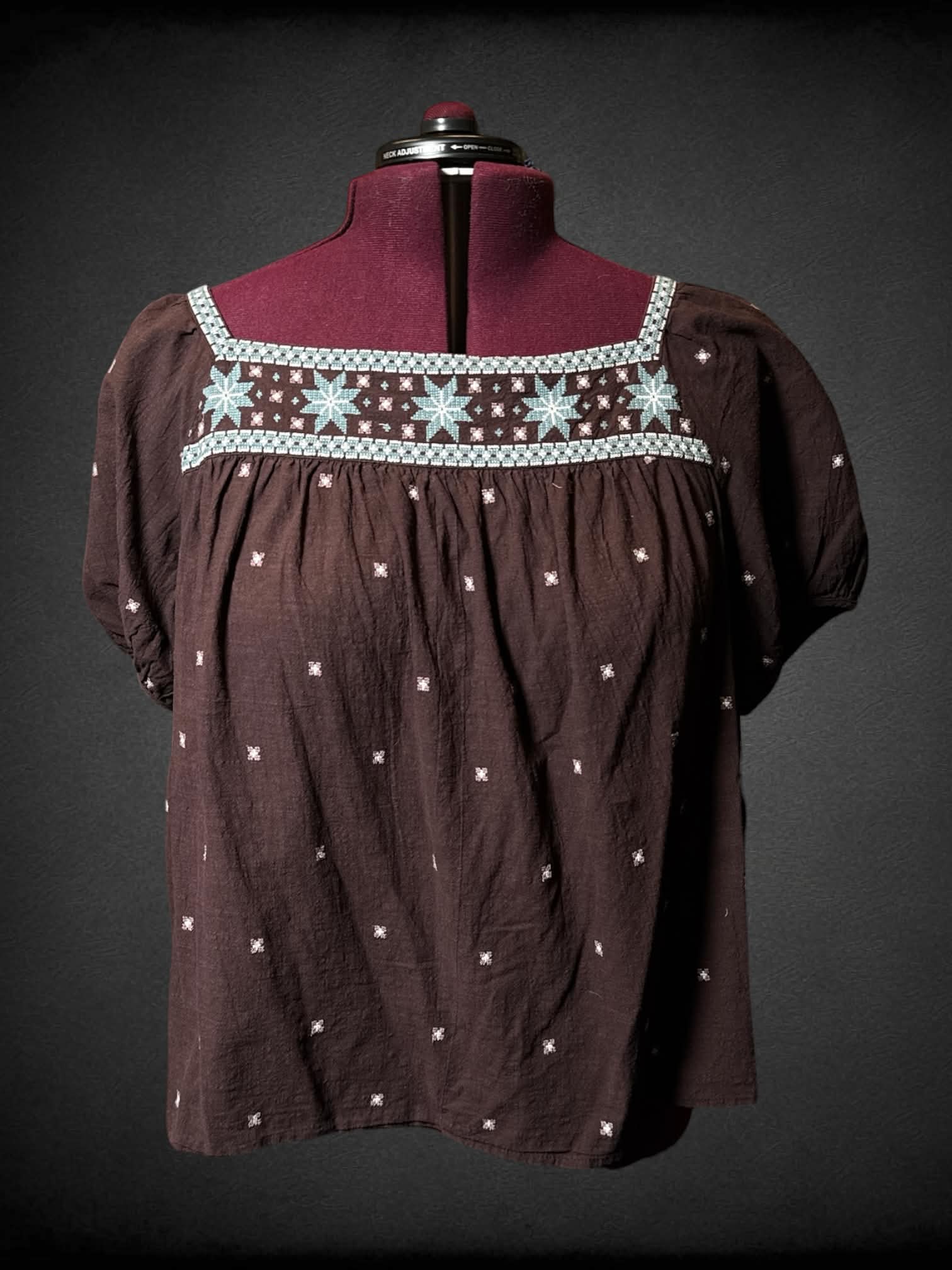 3X Madewell brown top with blue cross-stitch pattern