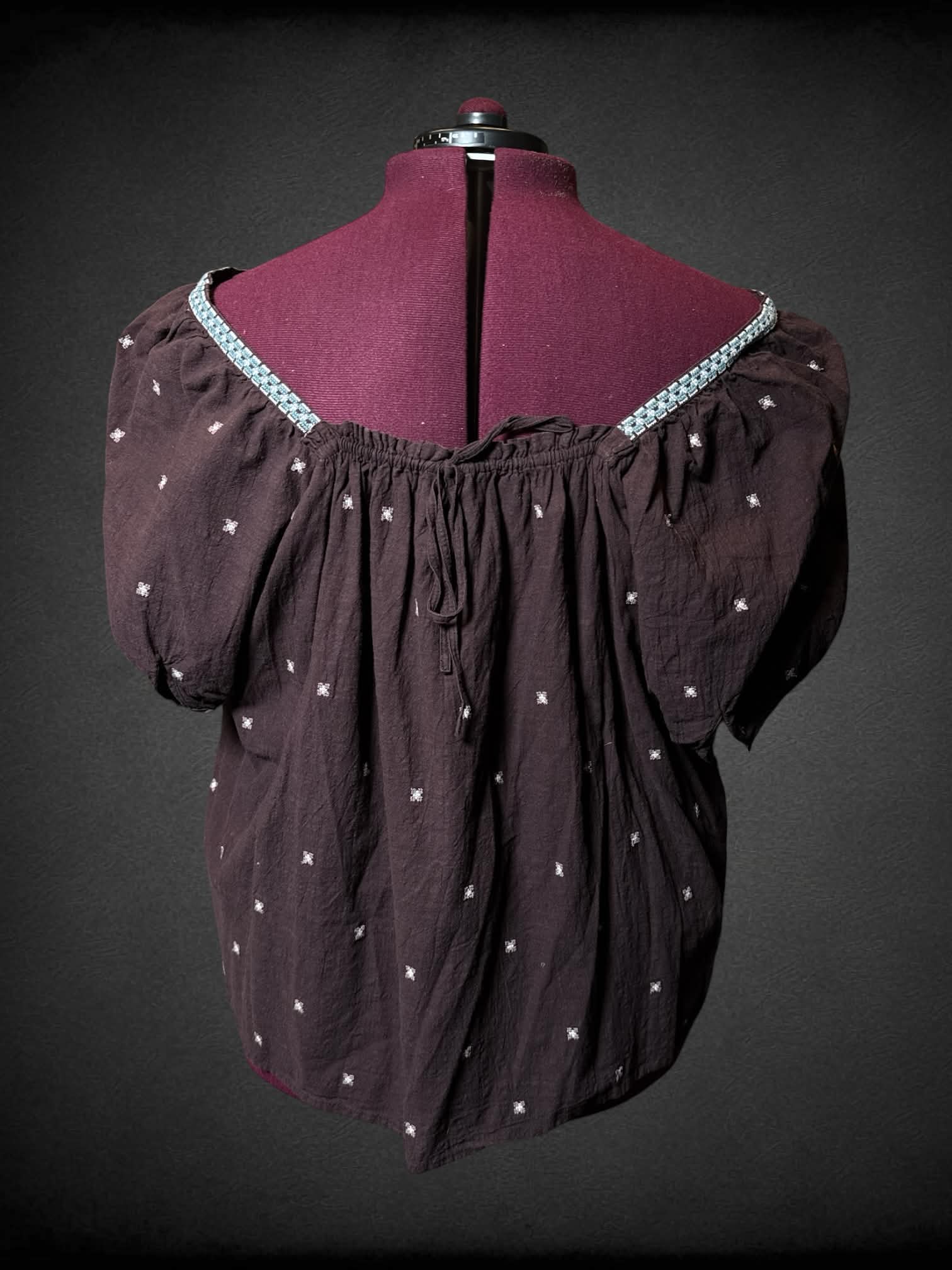 3X Madewell brown top with blue cross-stitch pattern