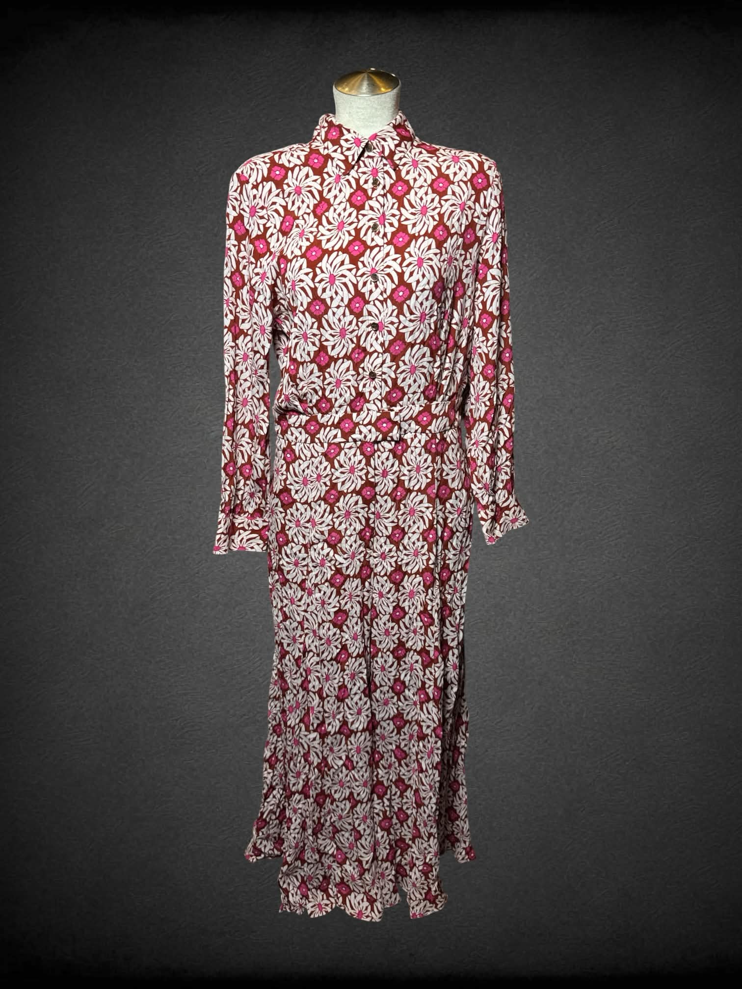 L Anthropologie white jumpsuit with pink & brown 70’s style ornamental design and pockets