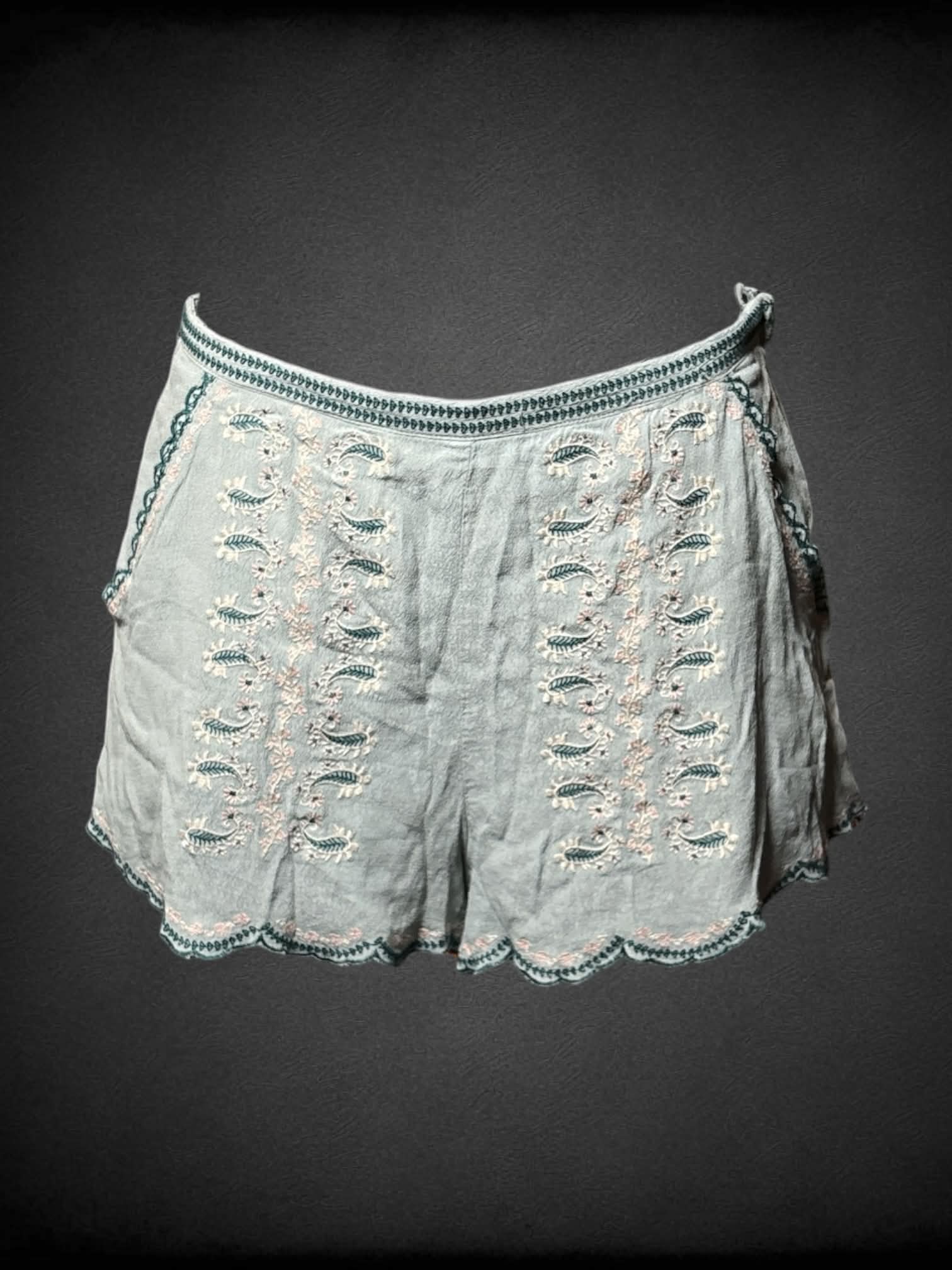 S Divided pale blue shorts with embroidered paisley design on front, and zipper on side