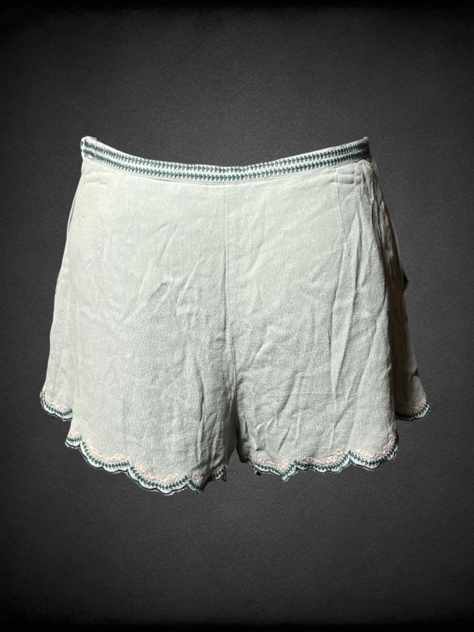 S Divided pale blue shorts with embroidered paisley design on front, and zipper on side