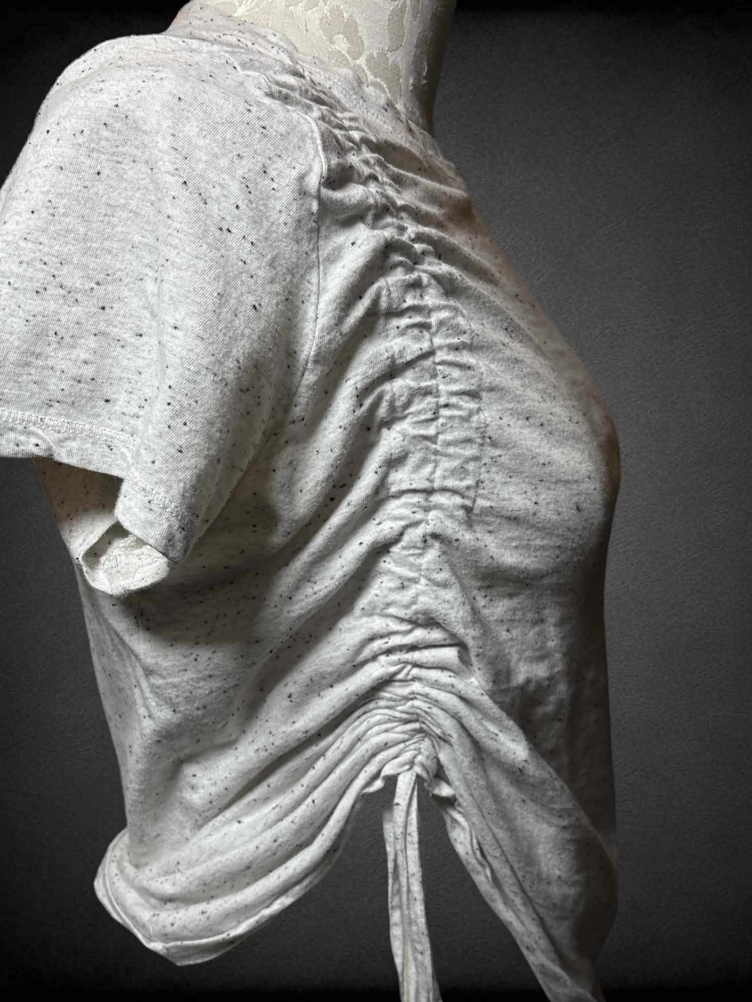 0X Be Boundless heather white t shirt with cinched side, and asymmetrical hem