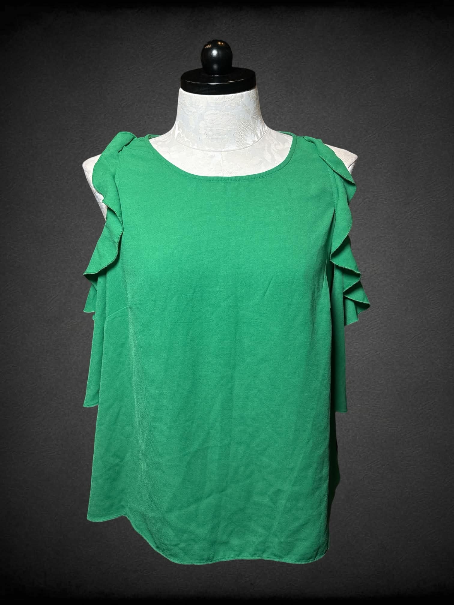 1X Green blouse with ruffle cut on shoulders