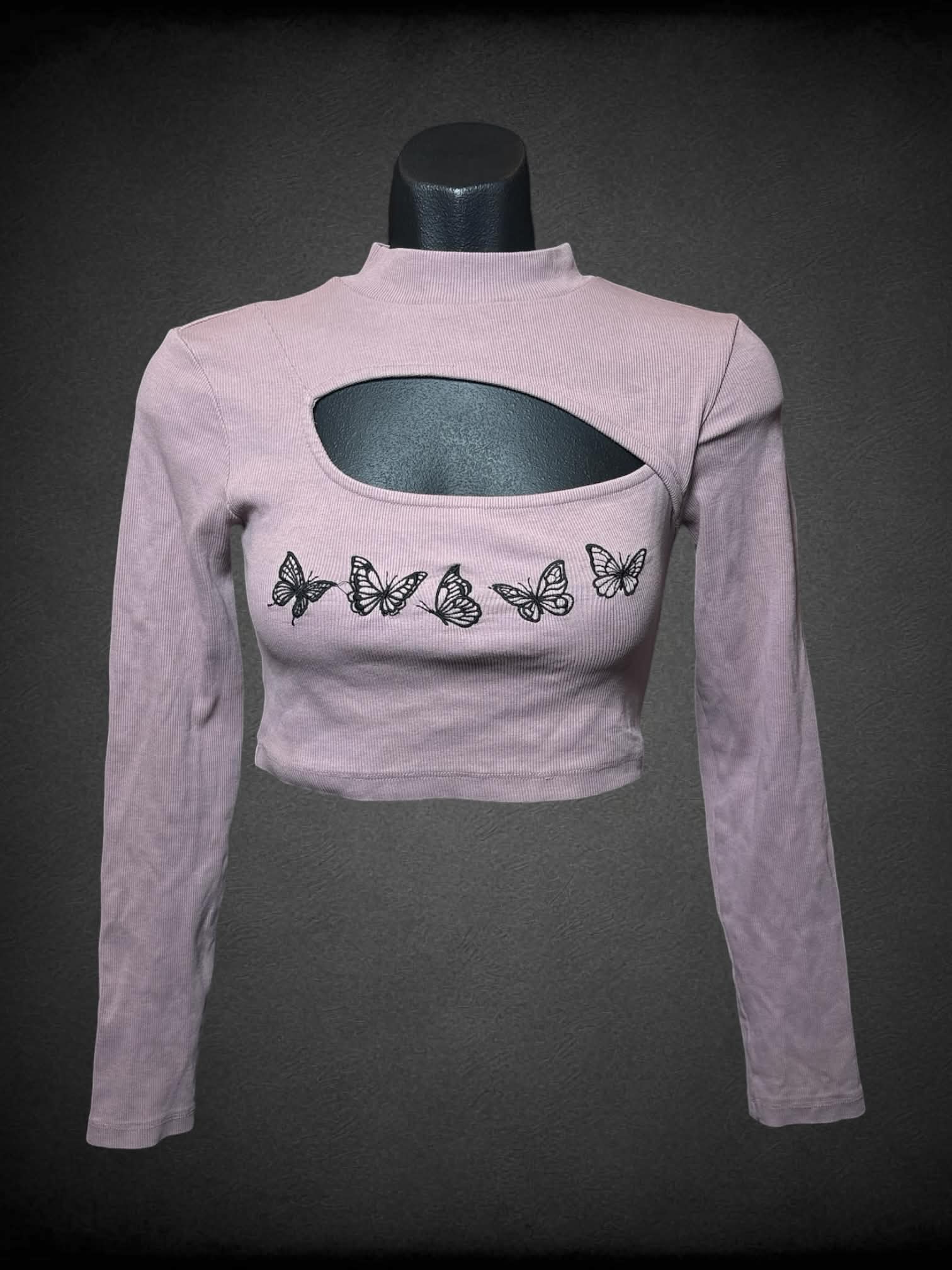 M Urban Outfitters mauve ribbed crop top with cutout on chest, and embroidered butterflies on front