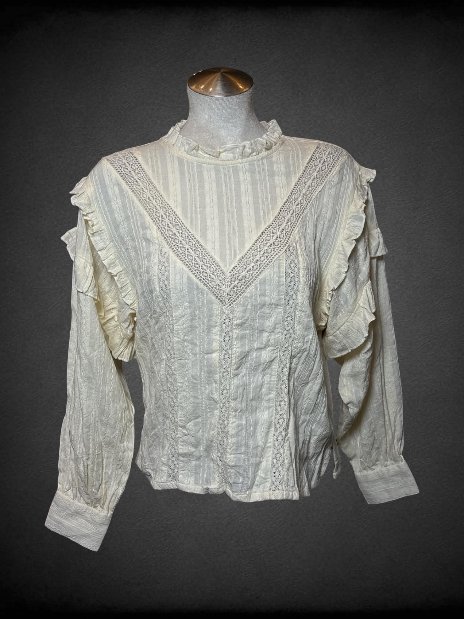 L MNG off-white prairie button-up shirt with lace detailing, and ruffled sleeves