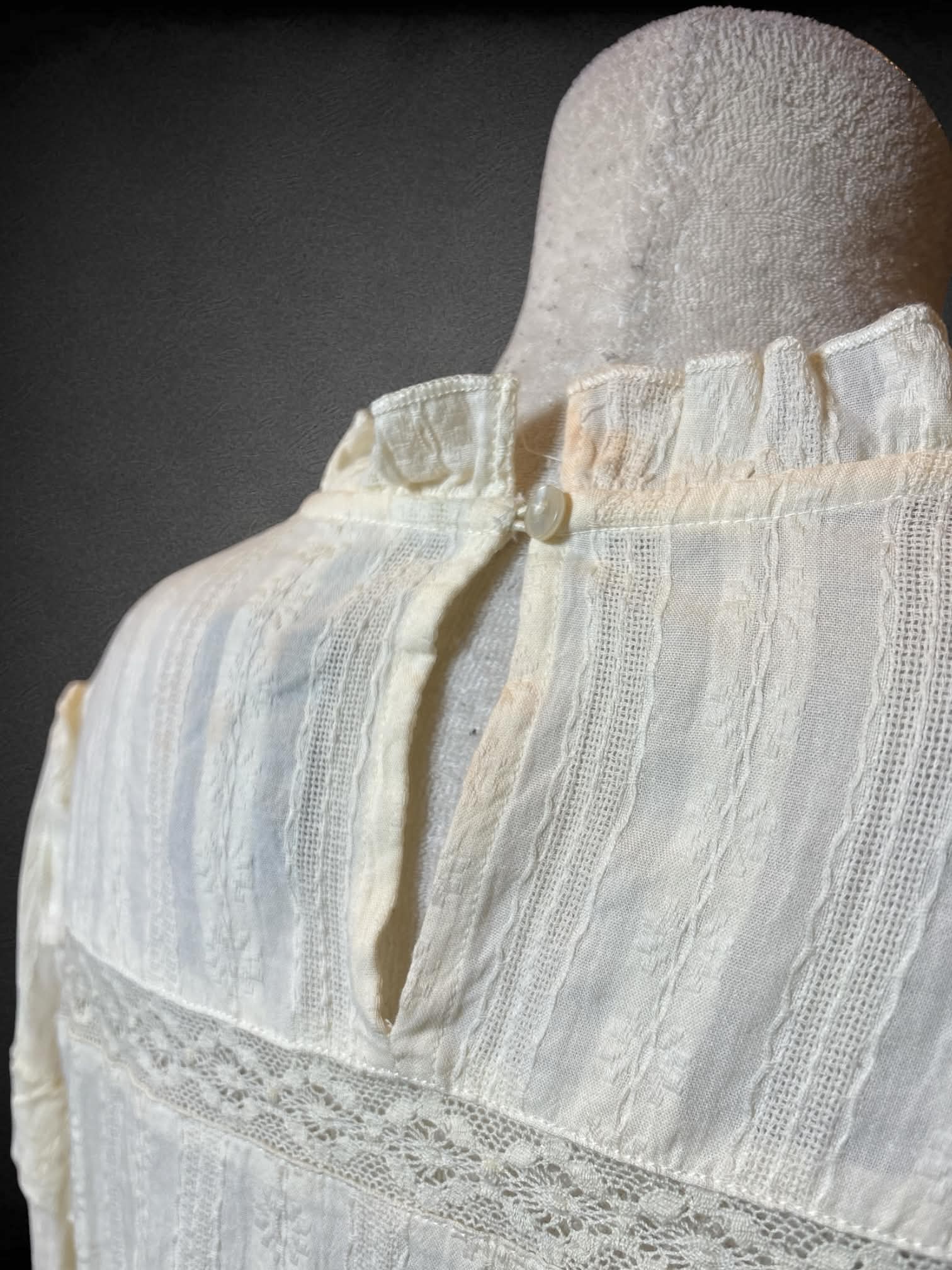 L MNG off-white prairie button-up shirt with lace detailing, and ruffled sleeves