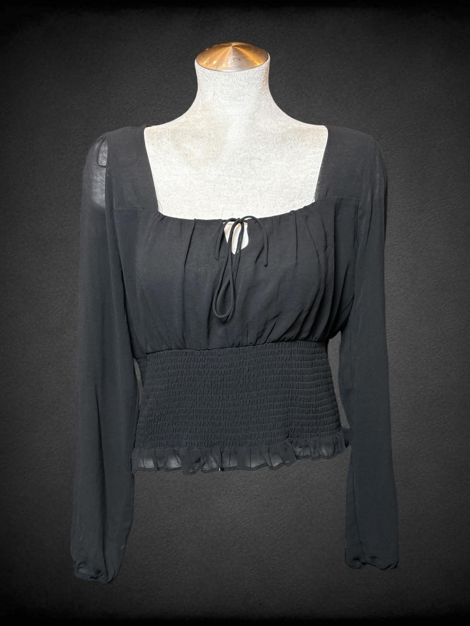 L Nine Britton black sheer top with shirred waist, and tie on front