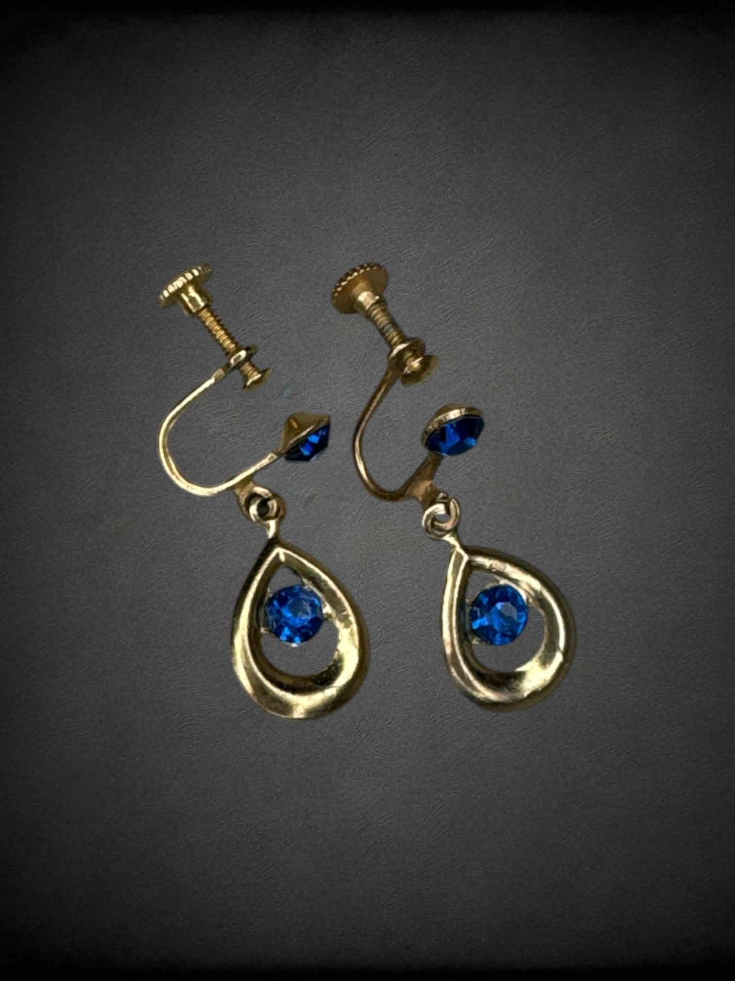 Vintage teardrop clip-on earrings with blue gem stones