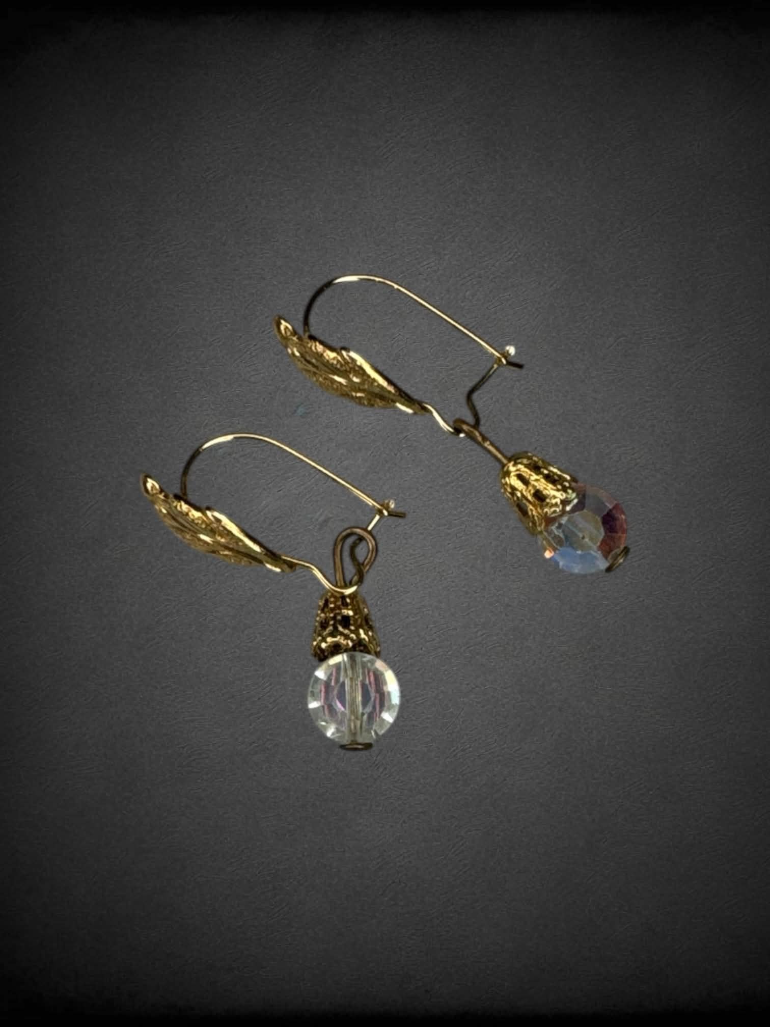 Vintage earrings with feather and prism bead
