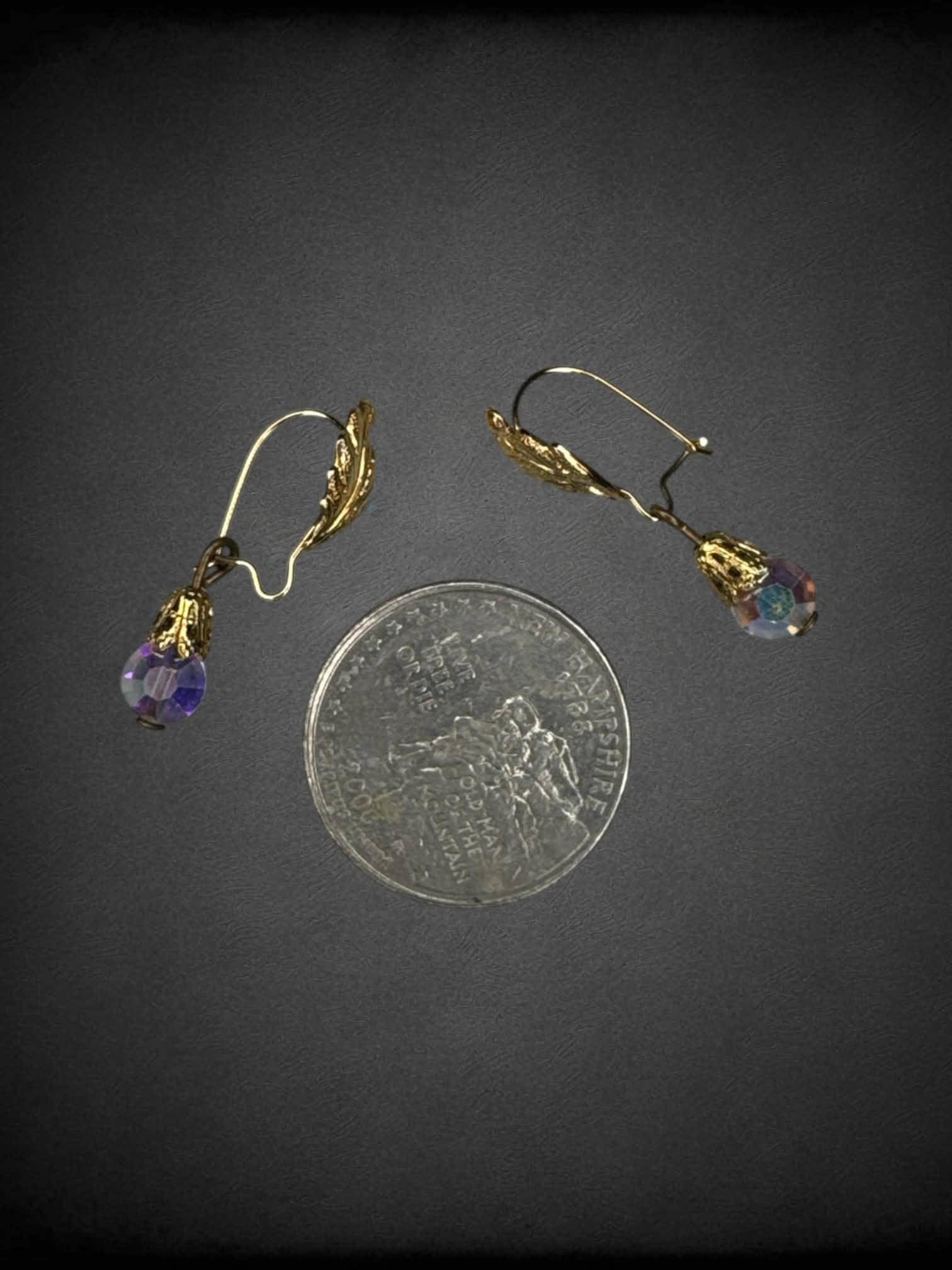 Vintage earrings with feather and prism bead