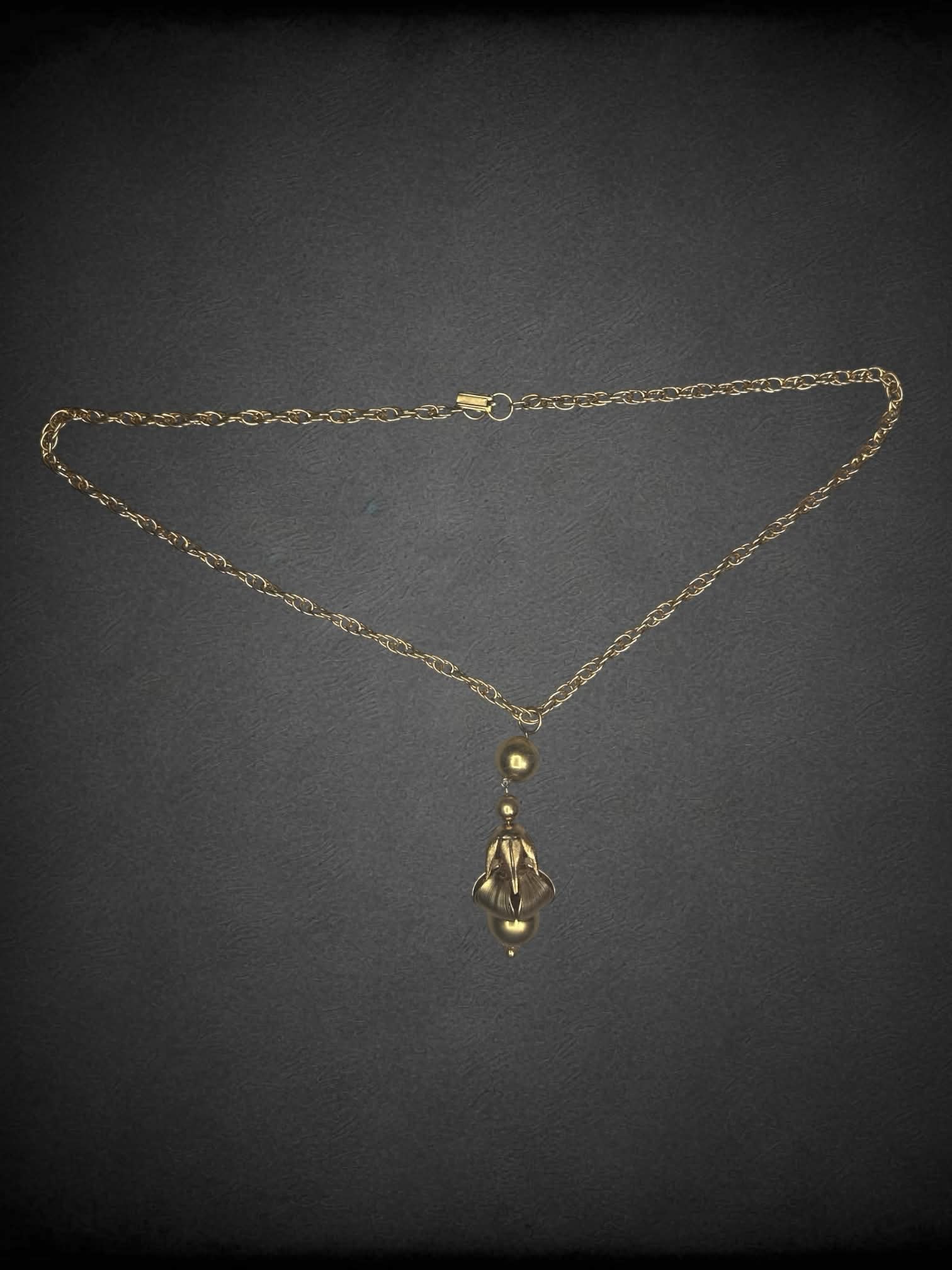 Vintage gold chain necklace with ornamental charm