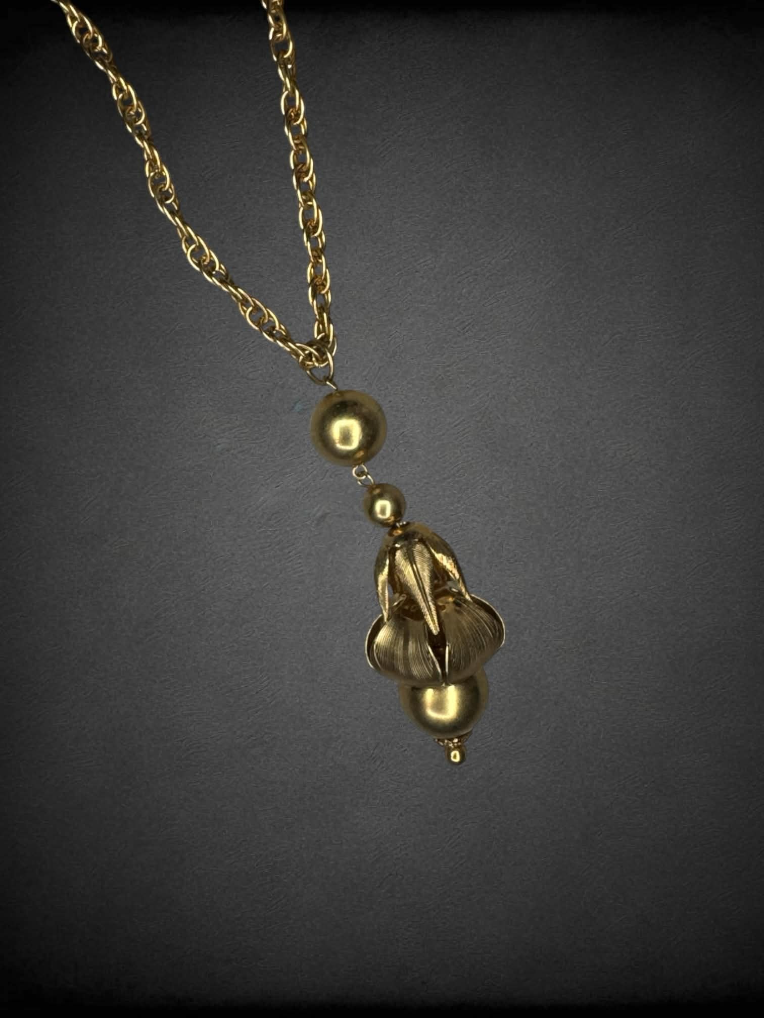 Vintage gold chain necklace with ornamental charm