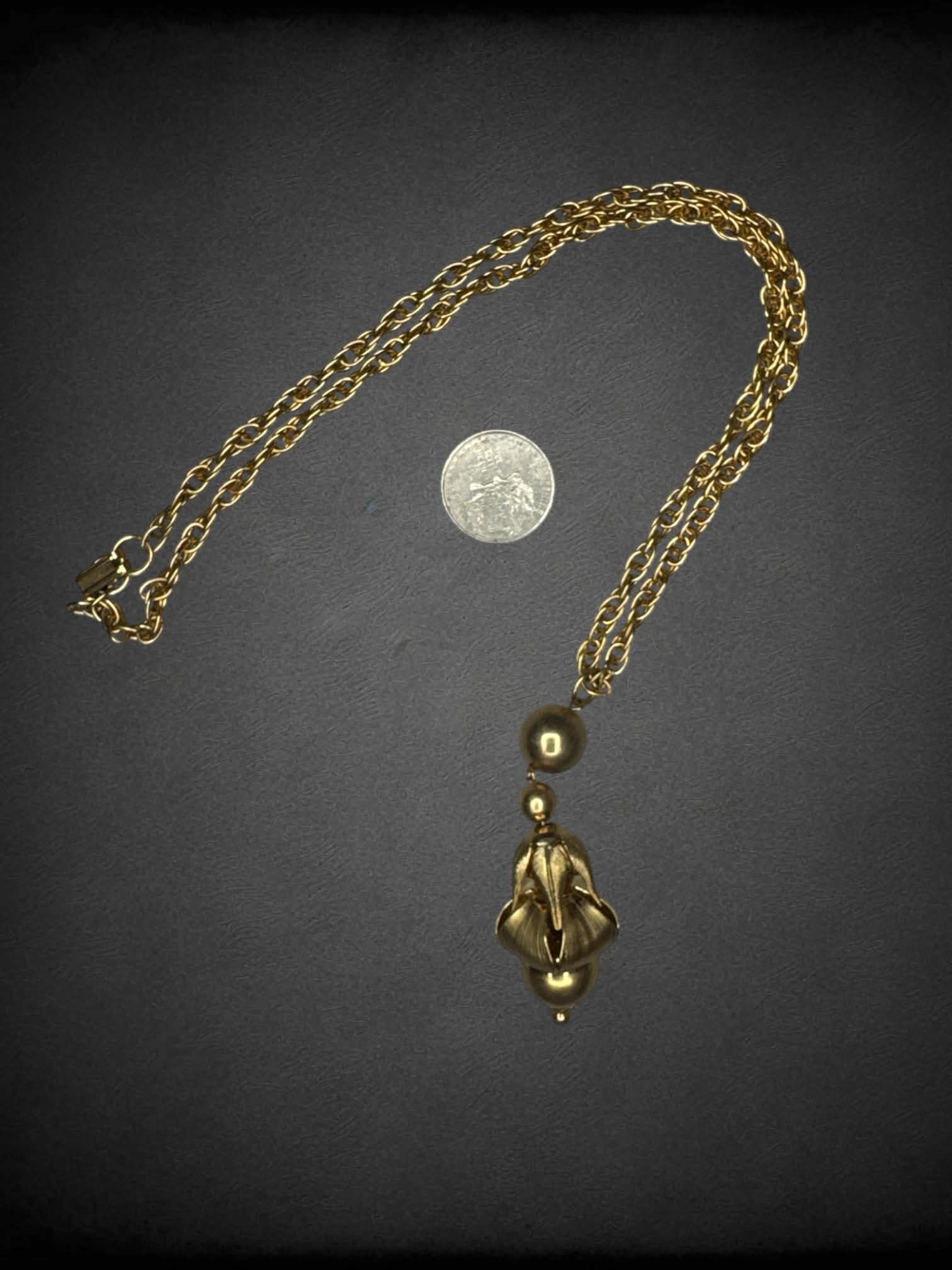 Vintage gold chain necklace with ornamental charm