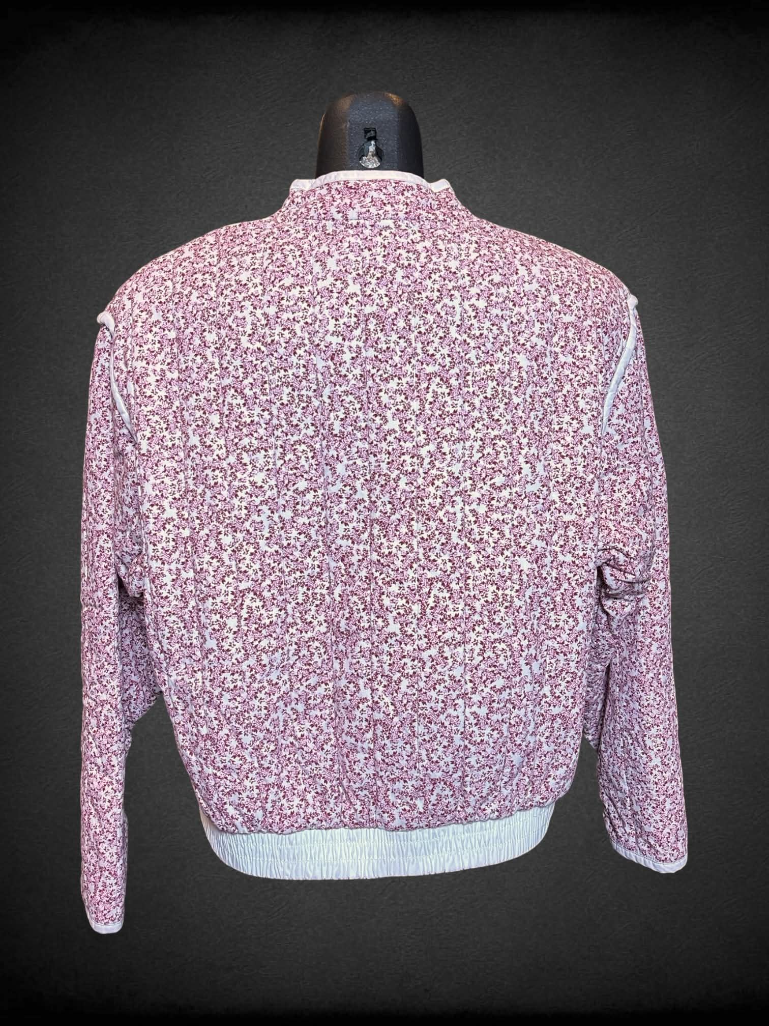 S Universal Thread pink quilt jacket with floral pattern, and buttons on front