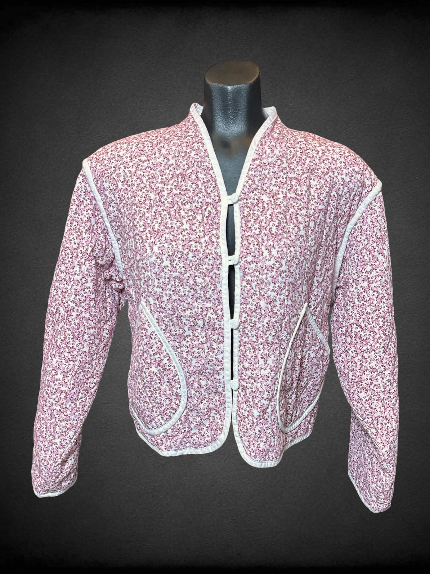 S Universal Thread pink quilt jacket with floral pattern, and buttons on front